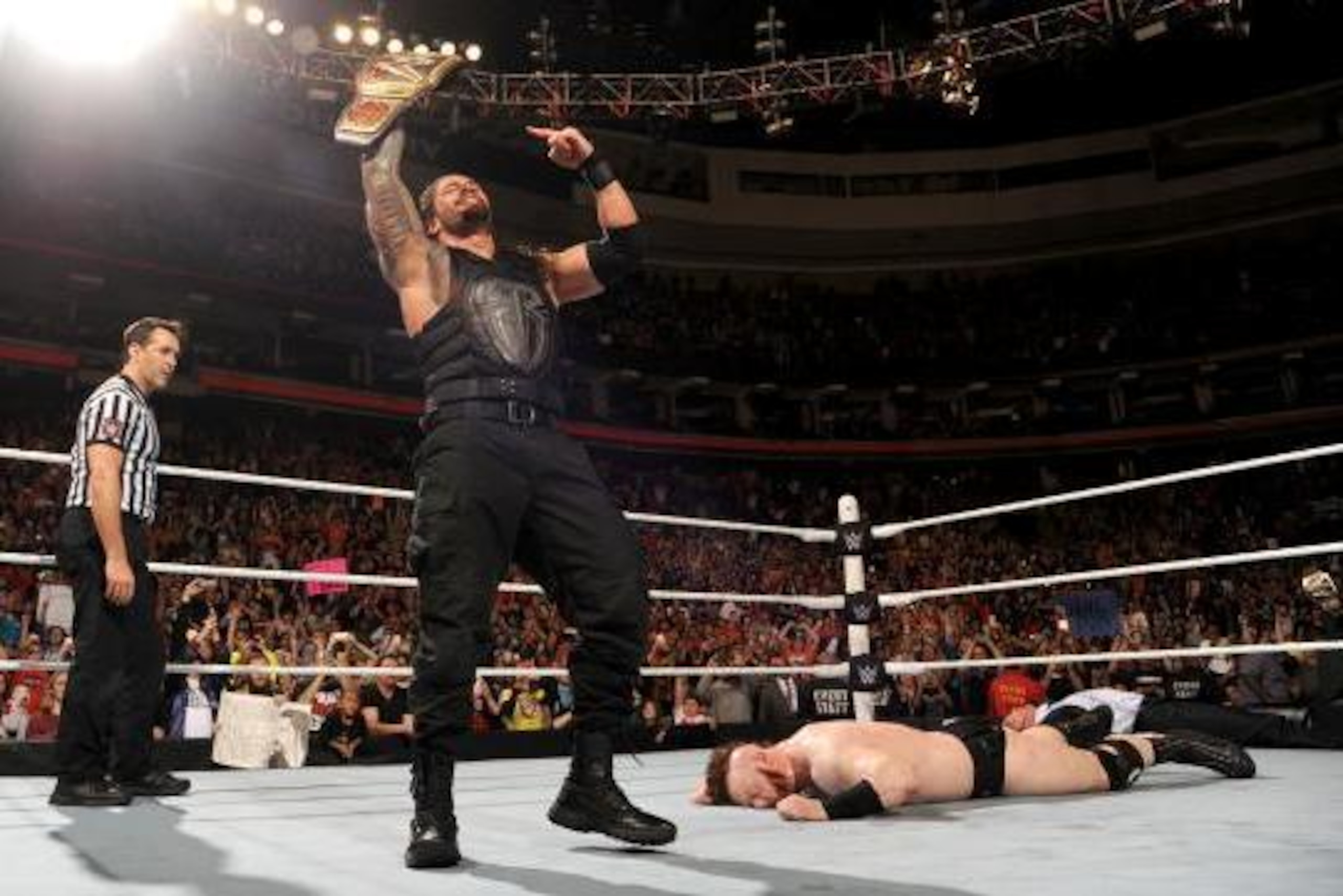 Roman Reigns wins the WWE World Heavyweight Championship on Raw.