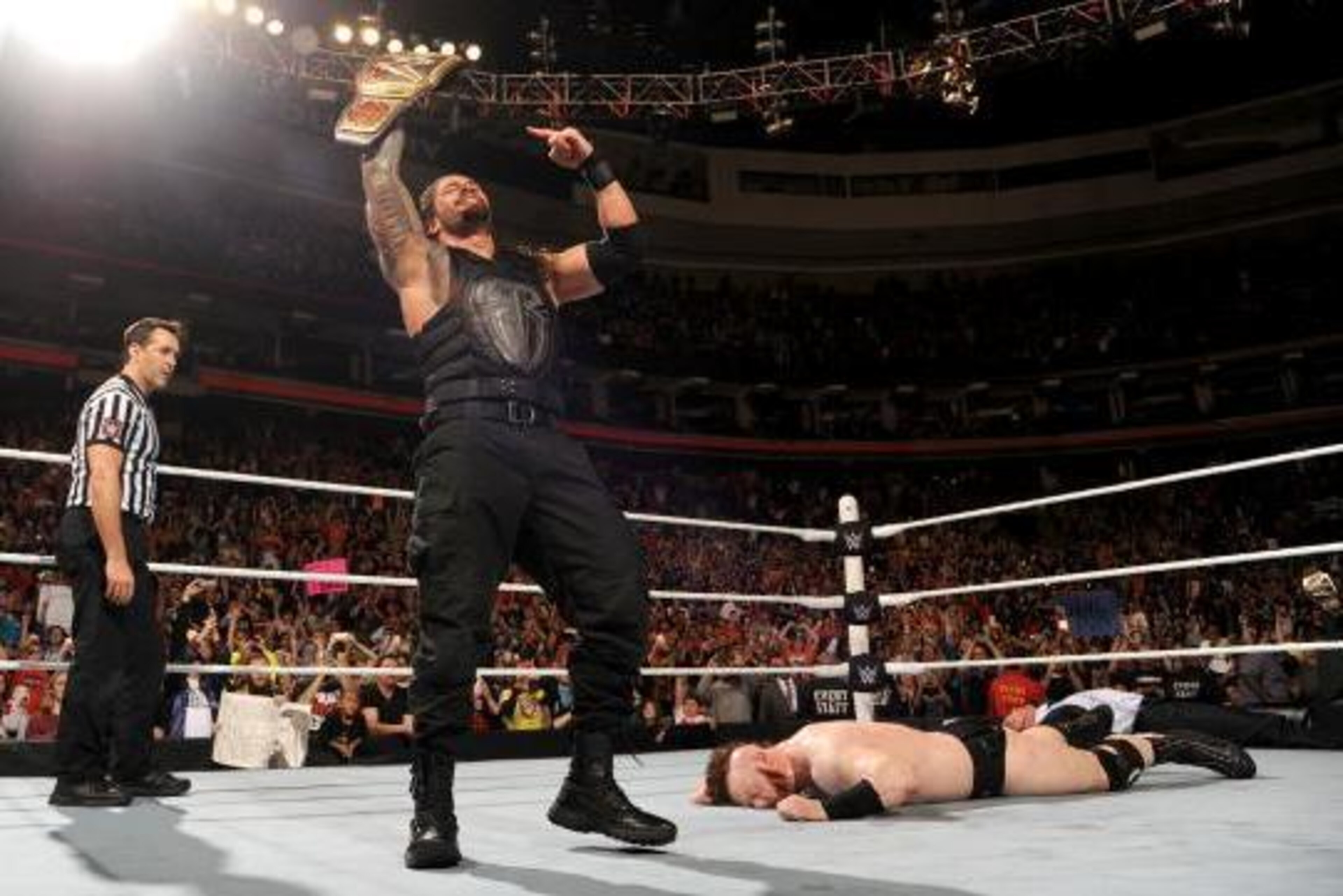 Roman Reigns wins the WWE World Heavyweight Championship on Raw.