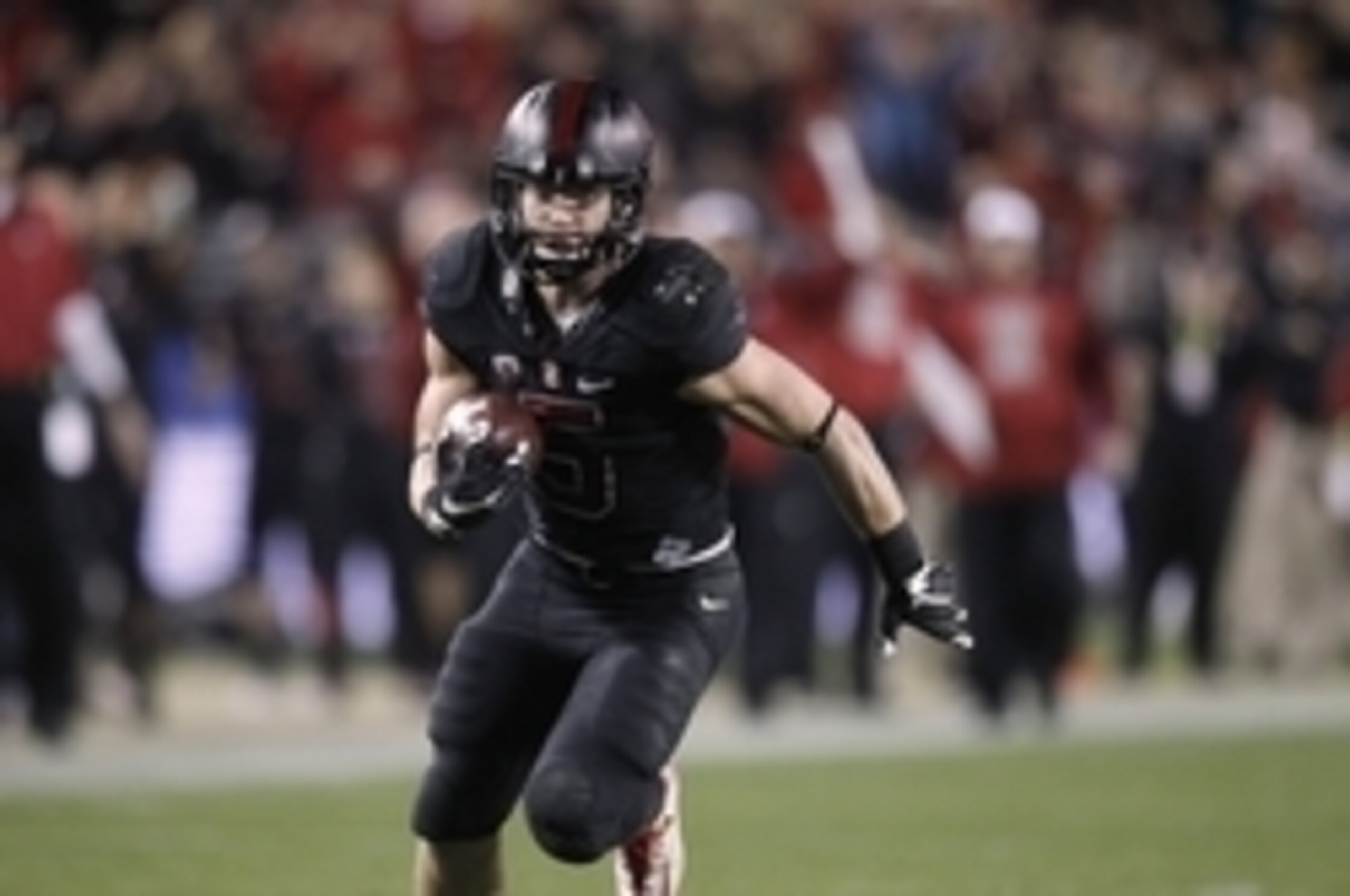 Dec 5, 2015; Santa Clara, CA, USA; Stanford Cardinal running back Christian McCaffrey (5) scores a 28 yard reception and touchdown against the Southern California Trojans in the fourth quarter of the Pac-12 Conference football championship game at Levi's 