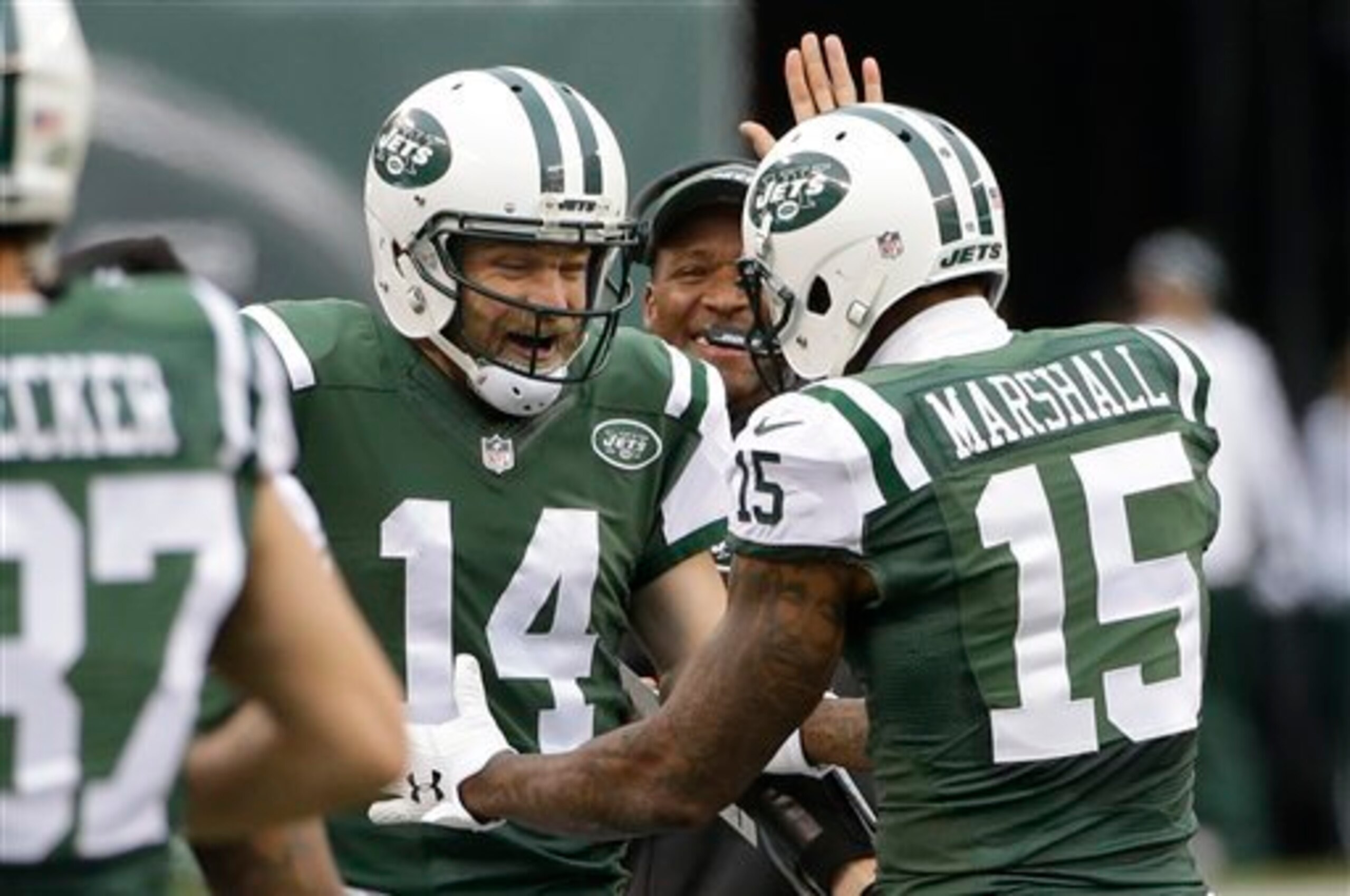 Ryan Fitzpatrick and Brandon Marshall celebrate a touchdown.