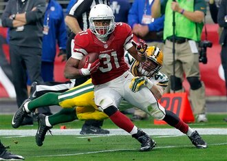 The Cardinals and Packers were playing at press time.