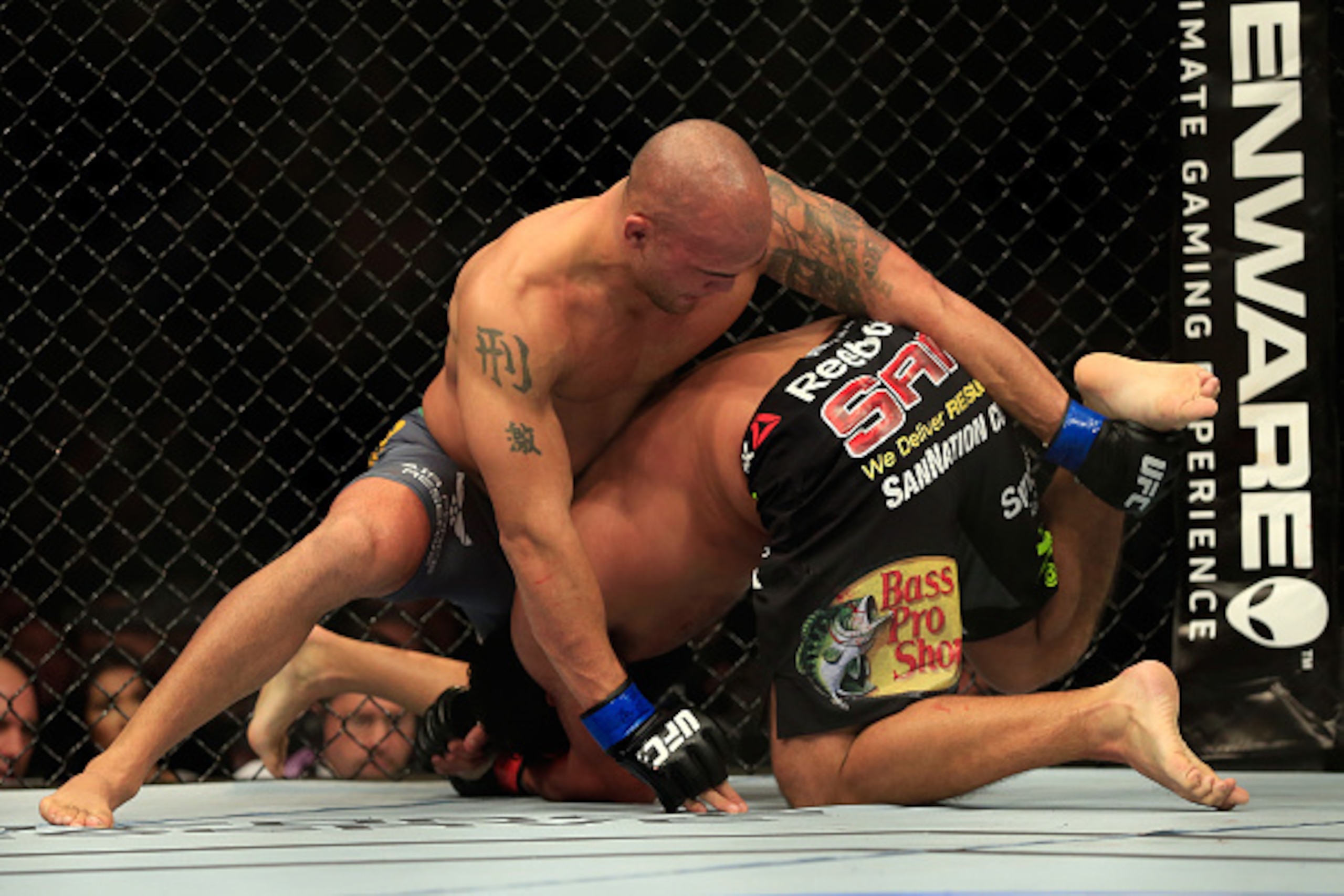 Robbie Lawler defends a Johny Hendricks' takedown attempt.