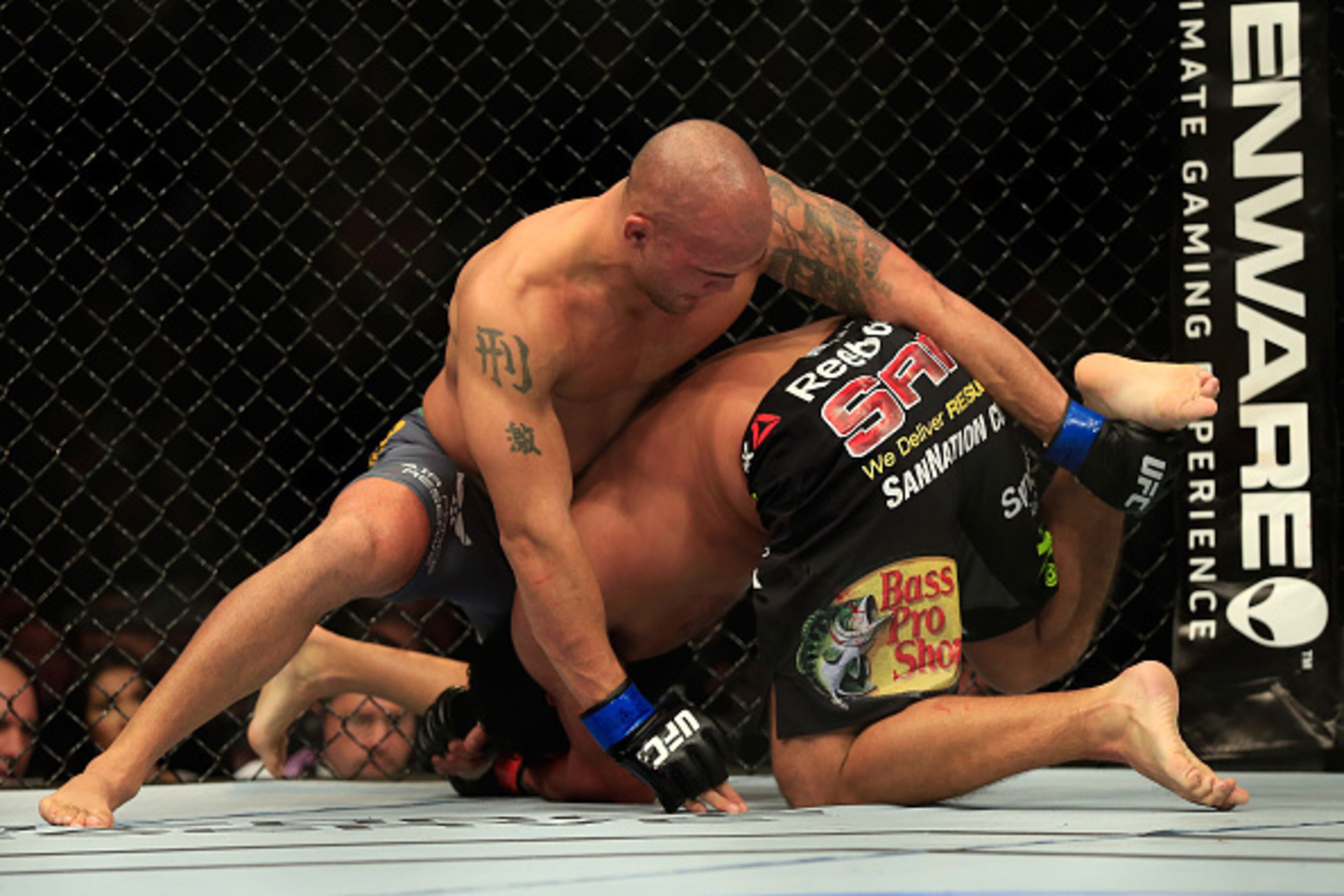 Robbie Lawler defends a Johny Hendricks' takedown attempt.