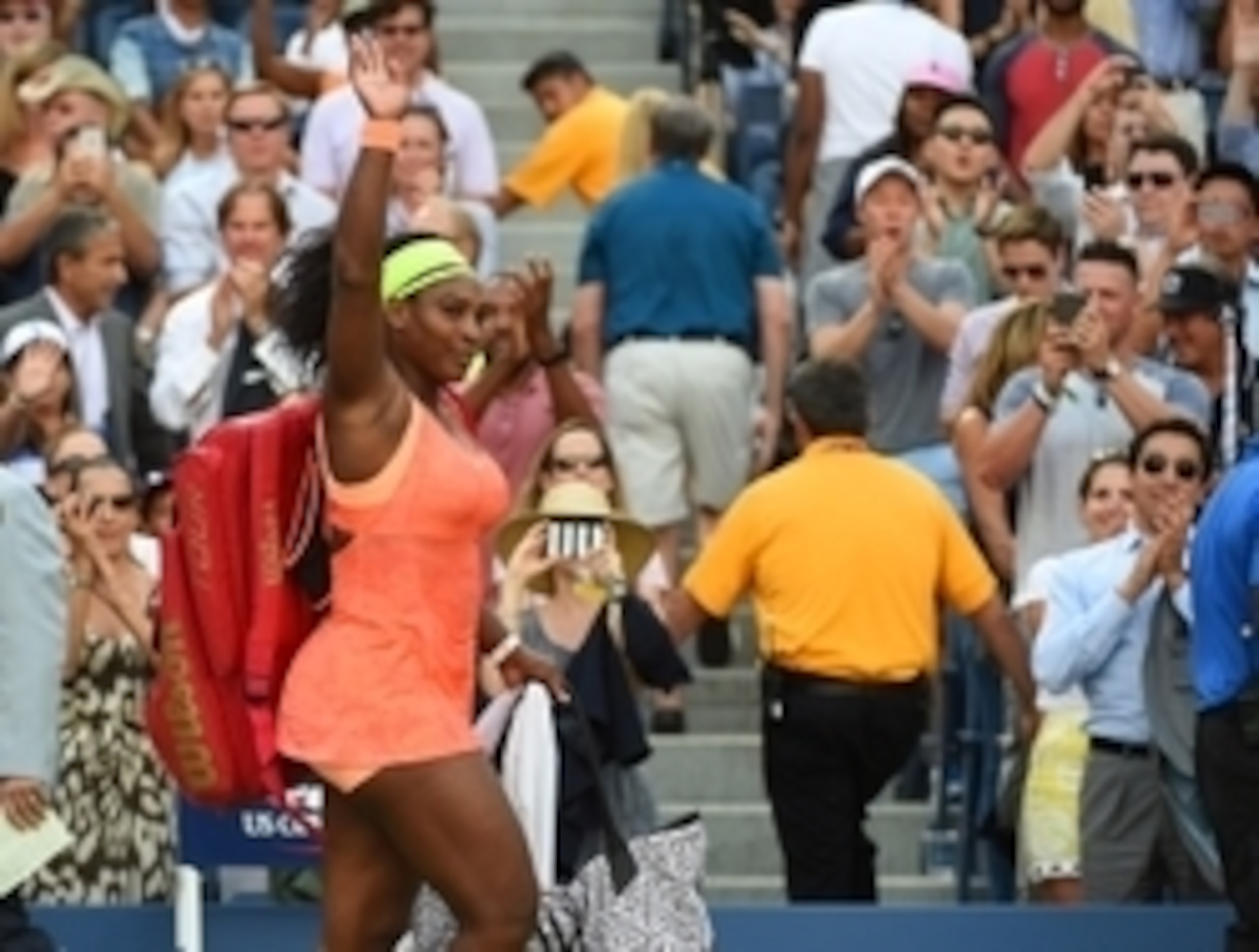 Serena Williams waves to the crowd after losing semifinal match at the 2015 U.S. Open.