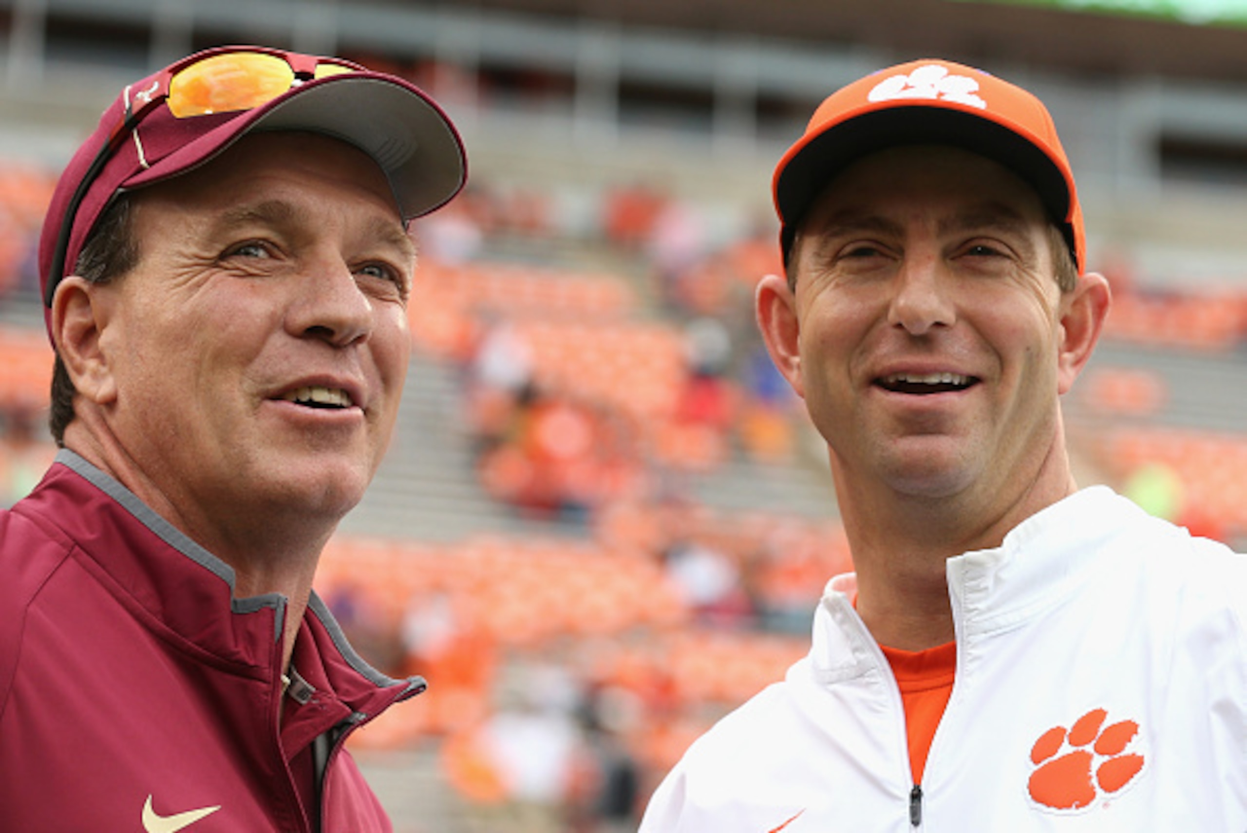 Florida State coach Jimbo Fisher, left, and Clemson coach Dabo Swinney are primed to sign impressive 2016 recruiting classes.