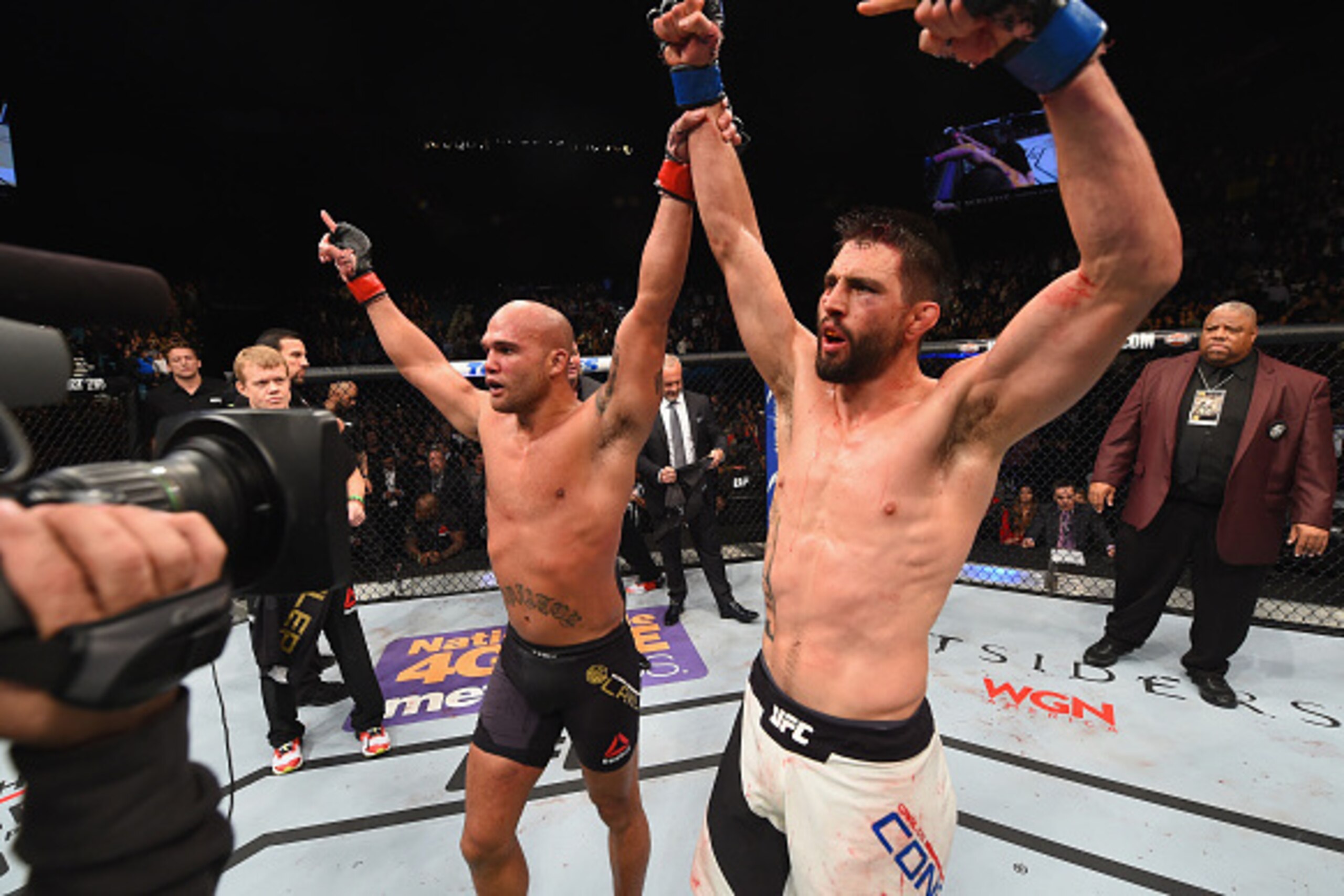 Robbie Lawler (left) and Carlos Condit fought for the welterweight title at UFC 195. Robbie Lawler (left) and Carlos Condit fought for the welterweight title at UFC 195.