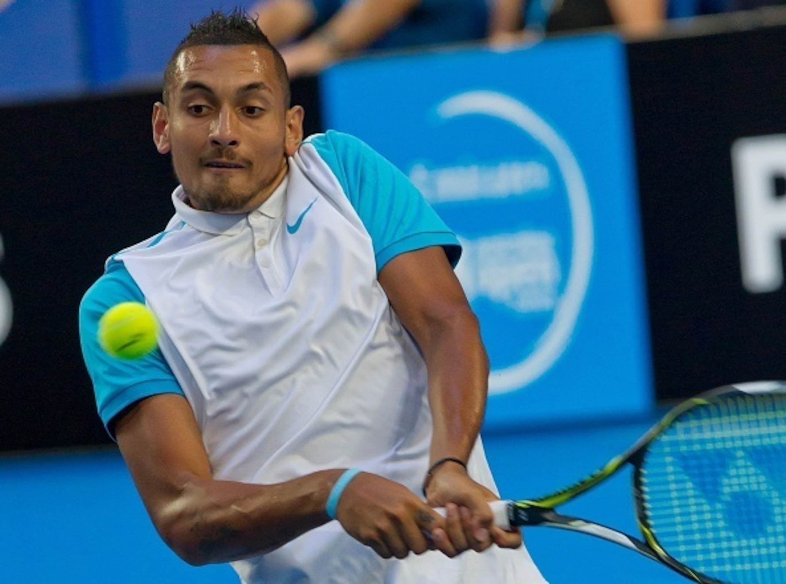 Nick Kyrgios hits a backhand during a match at the 2016 Hopman Cup in Perth, Australia.