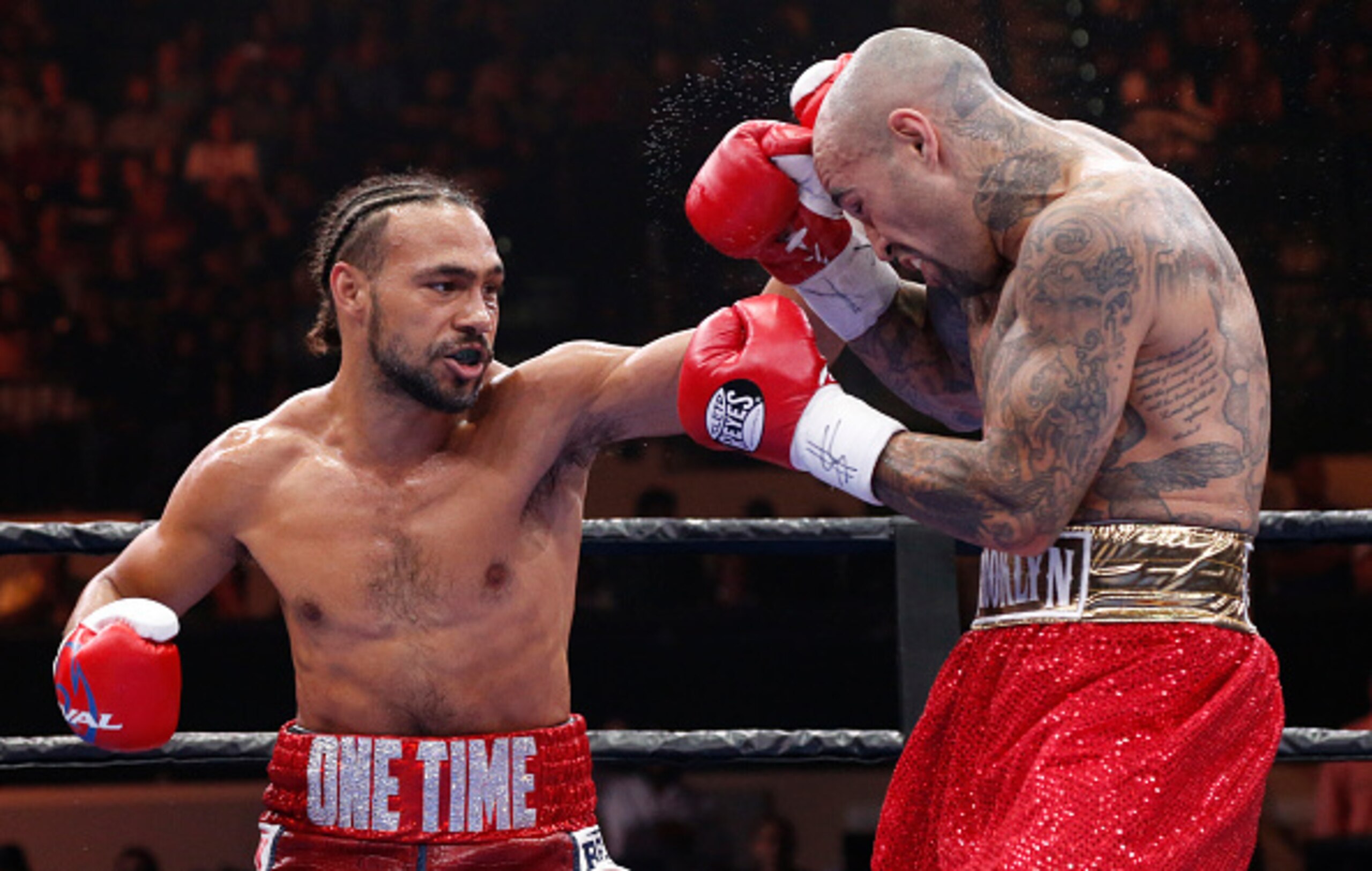 TAMPA, FL - JULY 11:  Keith Thurman (L) exchanges blows with Luis Collazo during their WBA Welterweight fight on July 11, 2015 at the USF Sun Dome in Tampa, Florida.  (Photo by Brian Blanco/Getty Images)