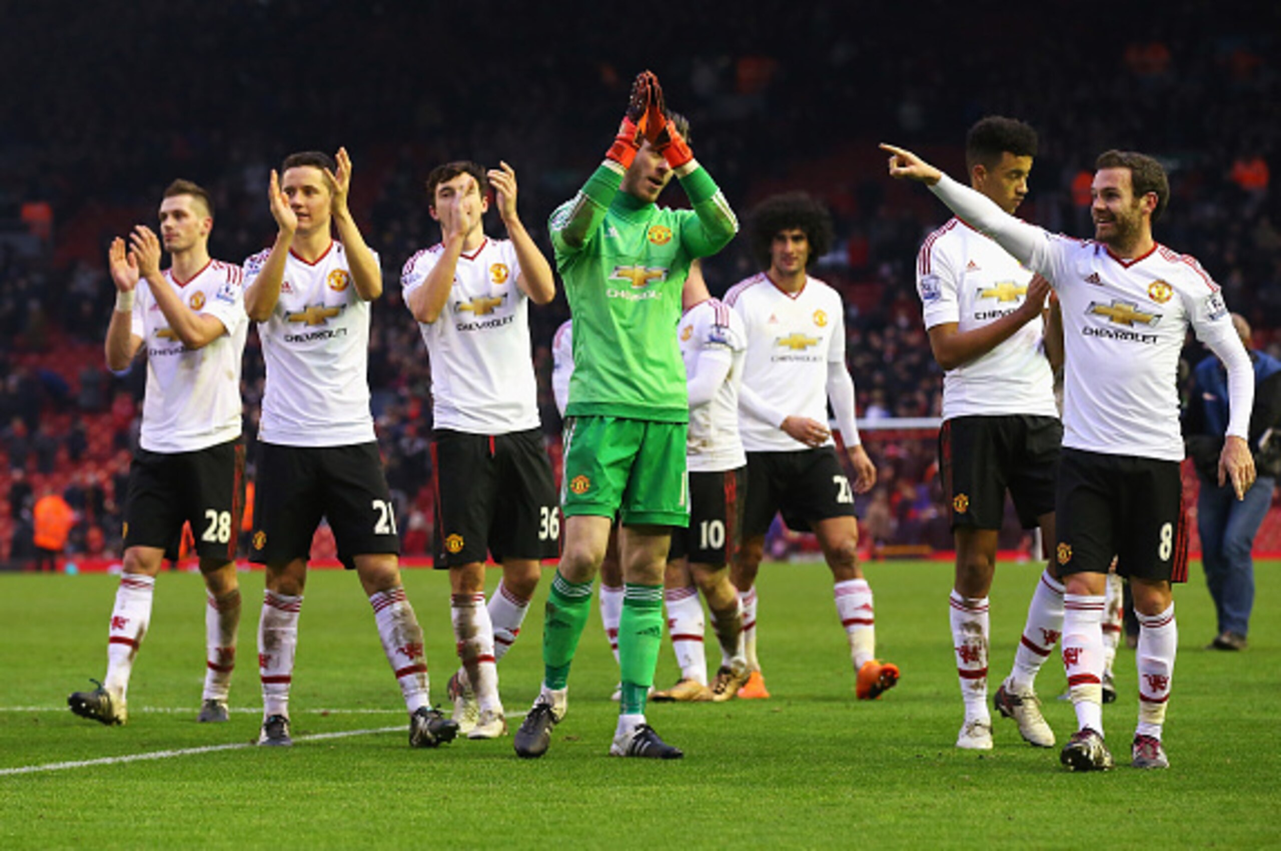 Manchester United celebrate their win over Liverpool on Sunday