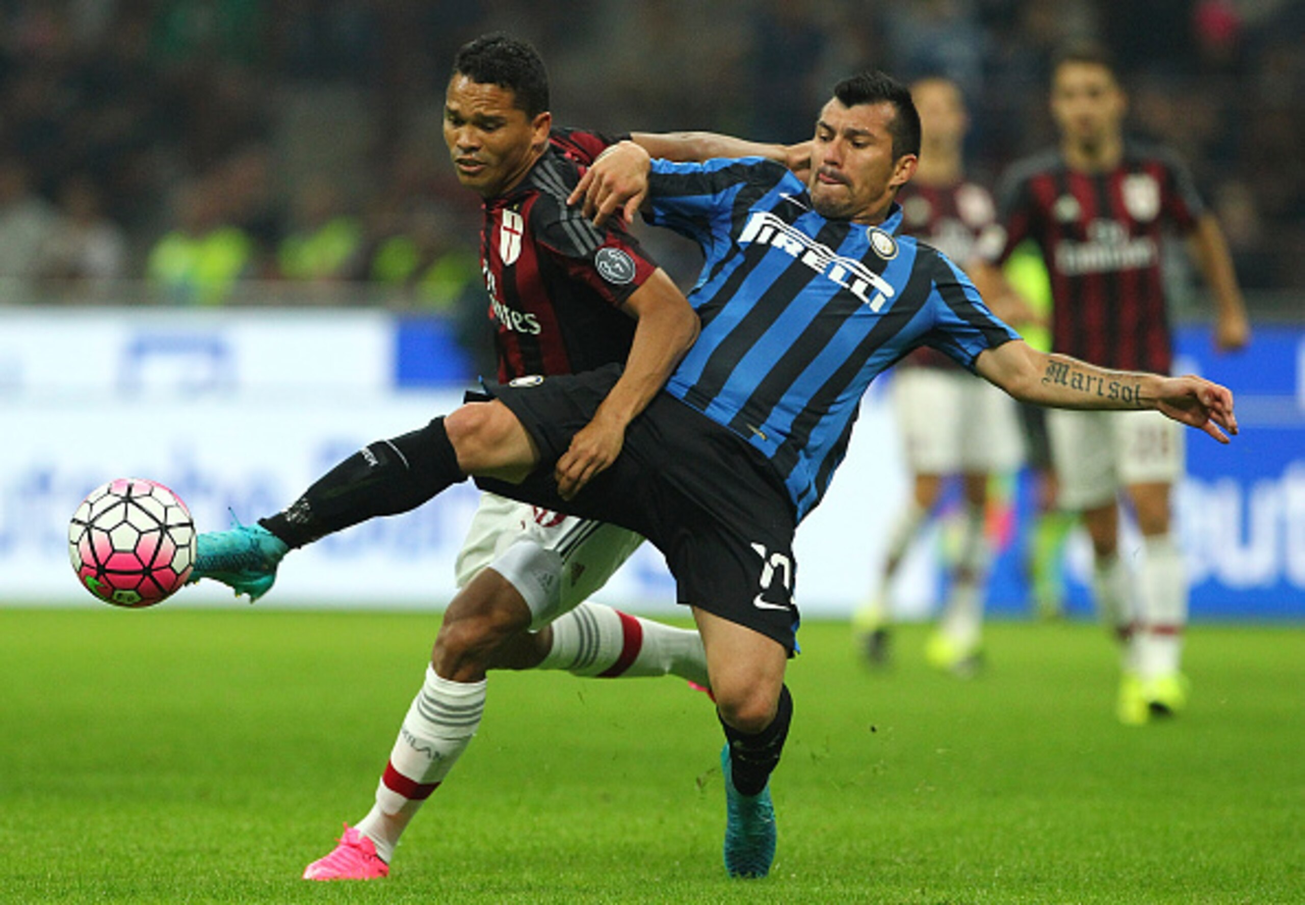 Carlos Bacca and Gary Medel battled in the first Derby della Madonnina in September. Carlos Bacca and Gary Medel battled in the first Derby della Madonnina in September.