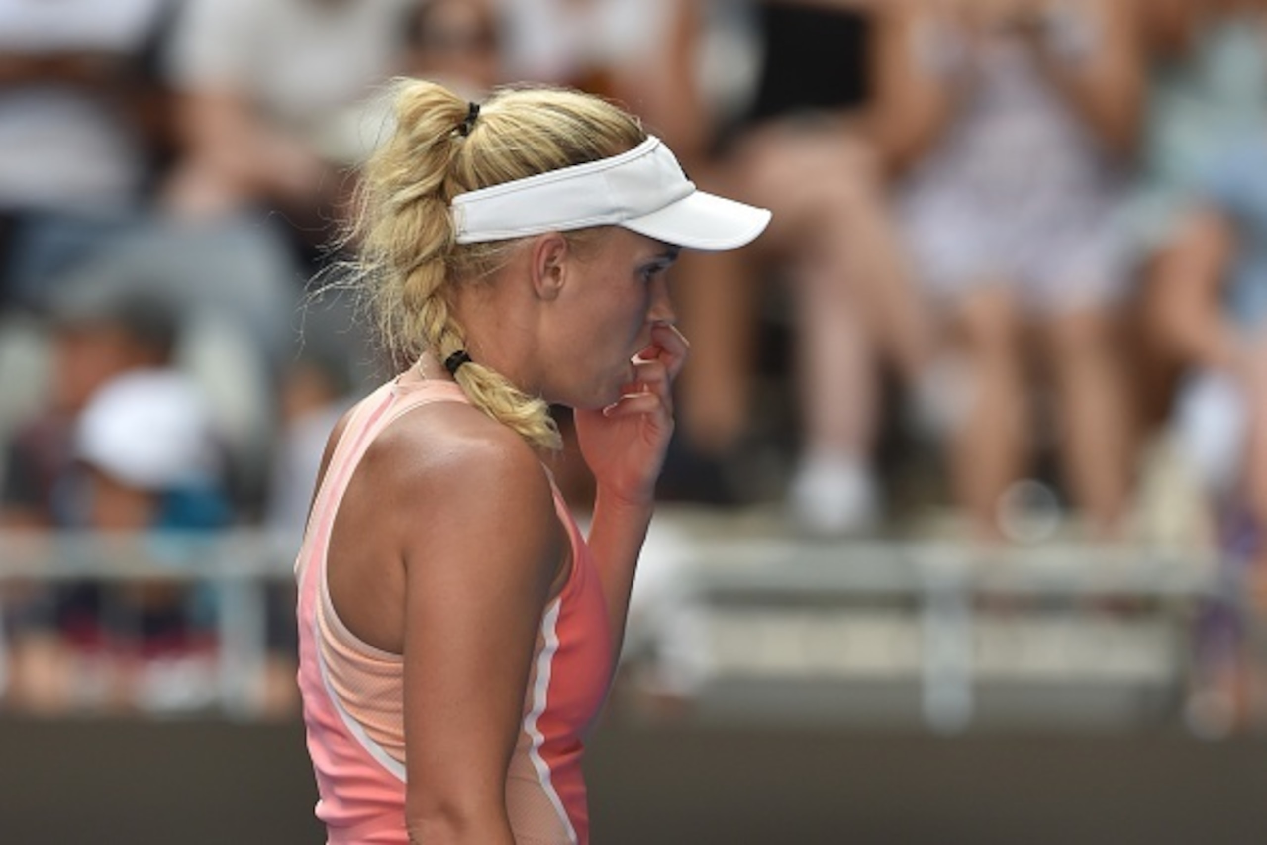 Caroline Wozniacki looks shocked during her first-round loss at the Australian Open.