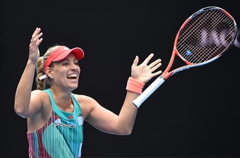 Kerber reacts after defeating Victoria Azarenka.