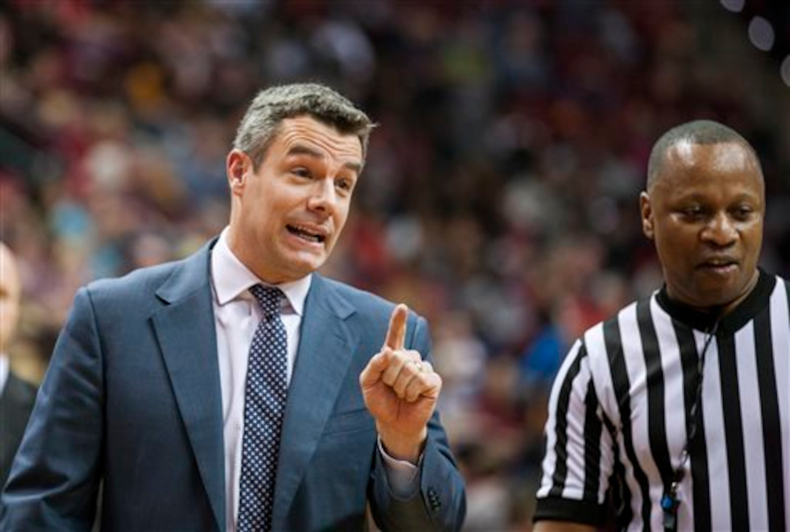 Virginia coach Tony Bennett (left)
