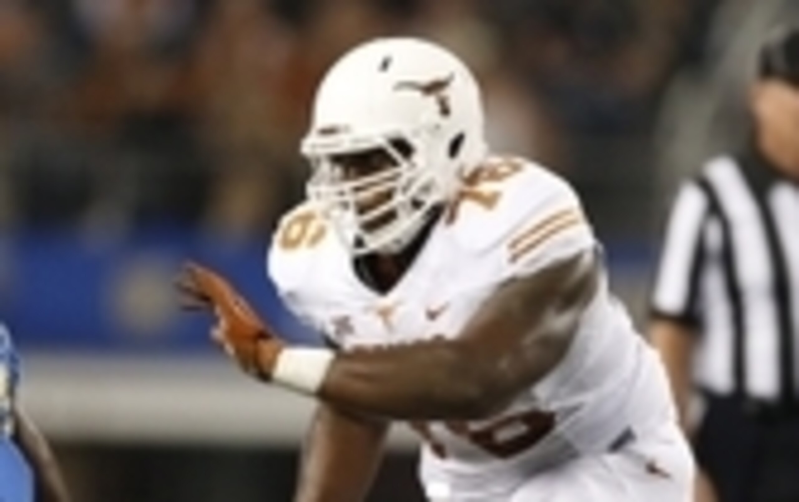 Sep 13, 2014; Arlington, TX, USA; Texas Longhorns tackle Kent Perkins (76) in action during the game against the UCLA Bruins at AT&T Stadium. Mandatory Credit: Matthew Emmons-USA TODAY Sports