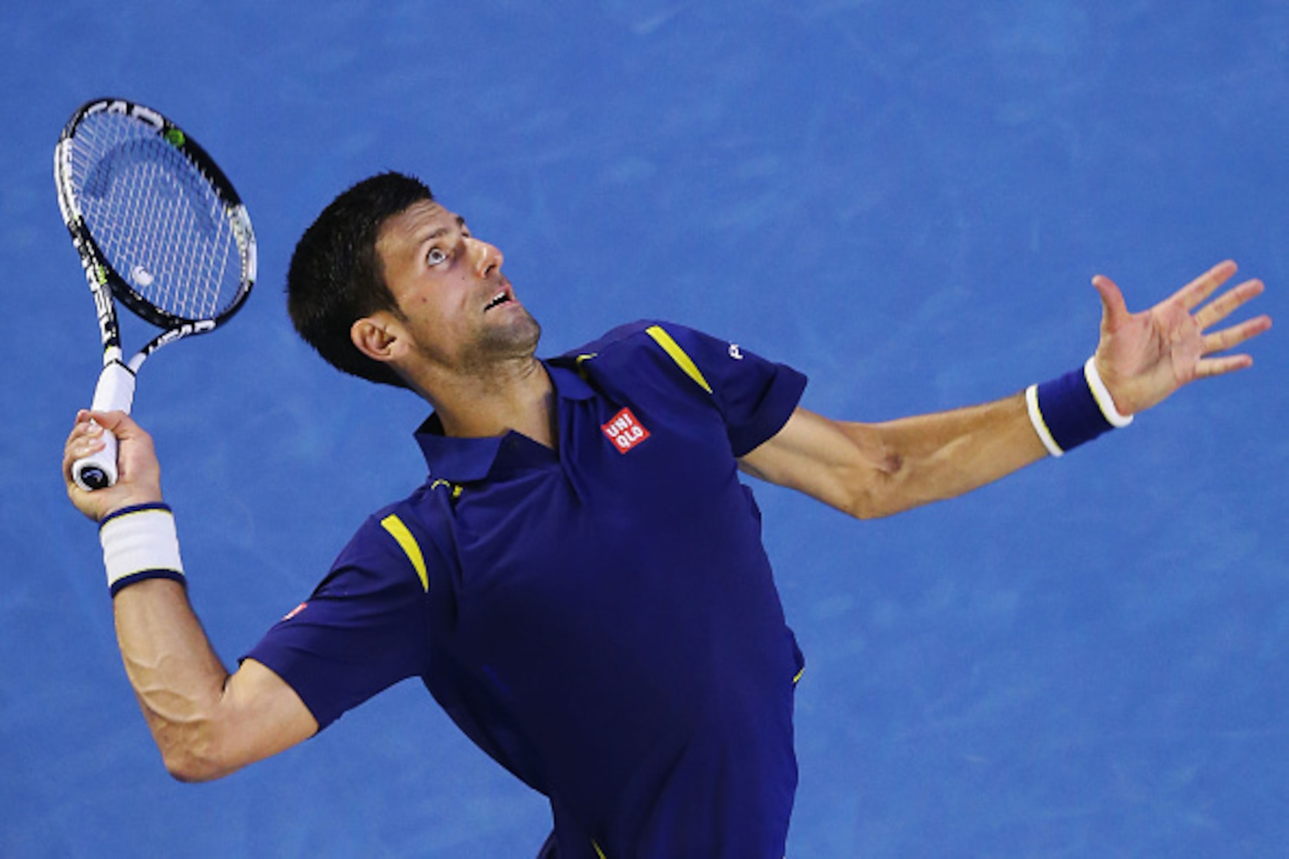 Novak Djokovic serves during his quarterfinal match at the 2016 Australian Open.