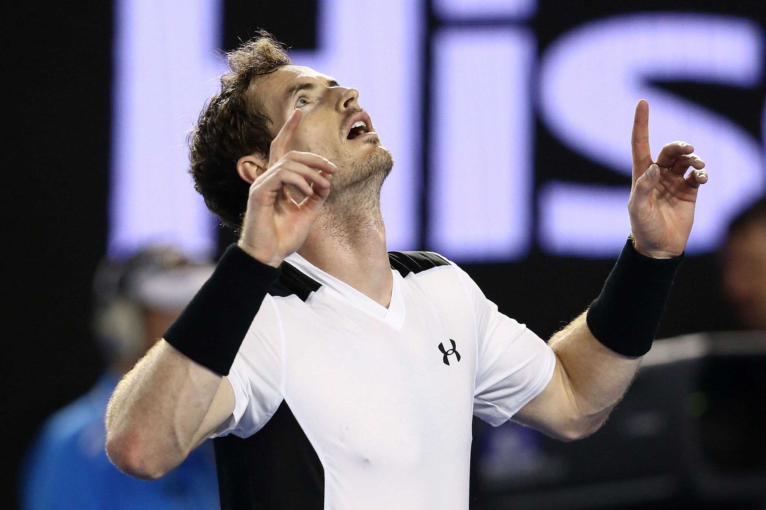 Andy Murray points to the sky after winning his quarterfinals match at the 2016 Australian Open.