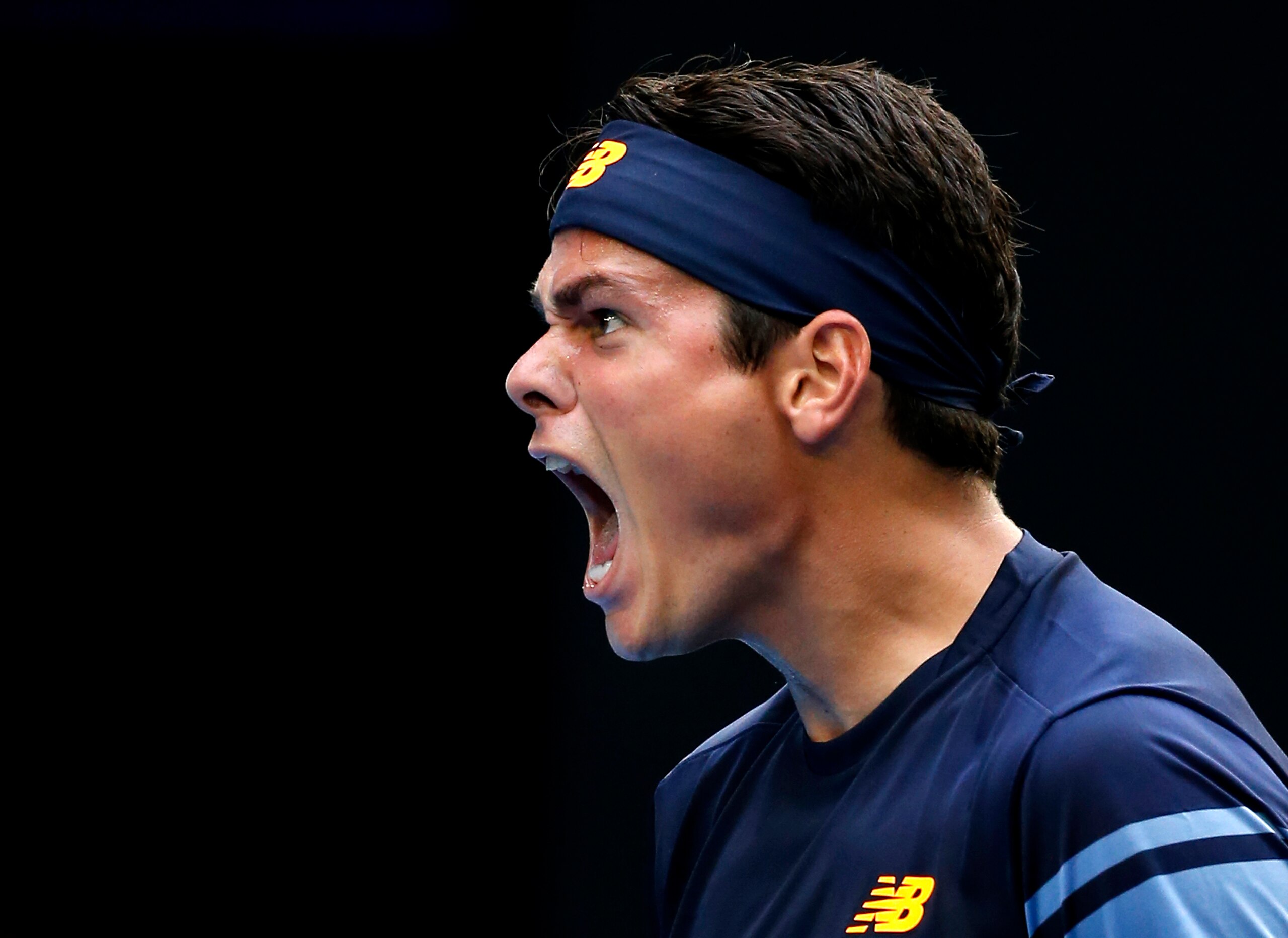 Milos Raonic roars during his quarterfinals match at the 2016 Australian Open.