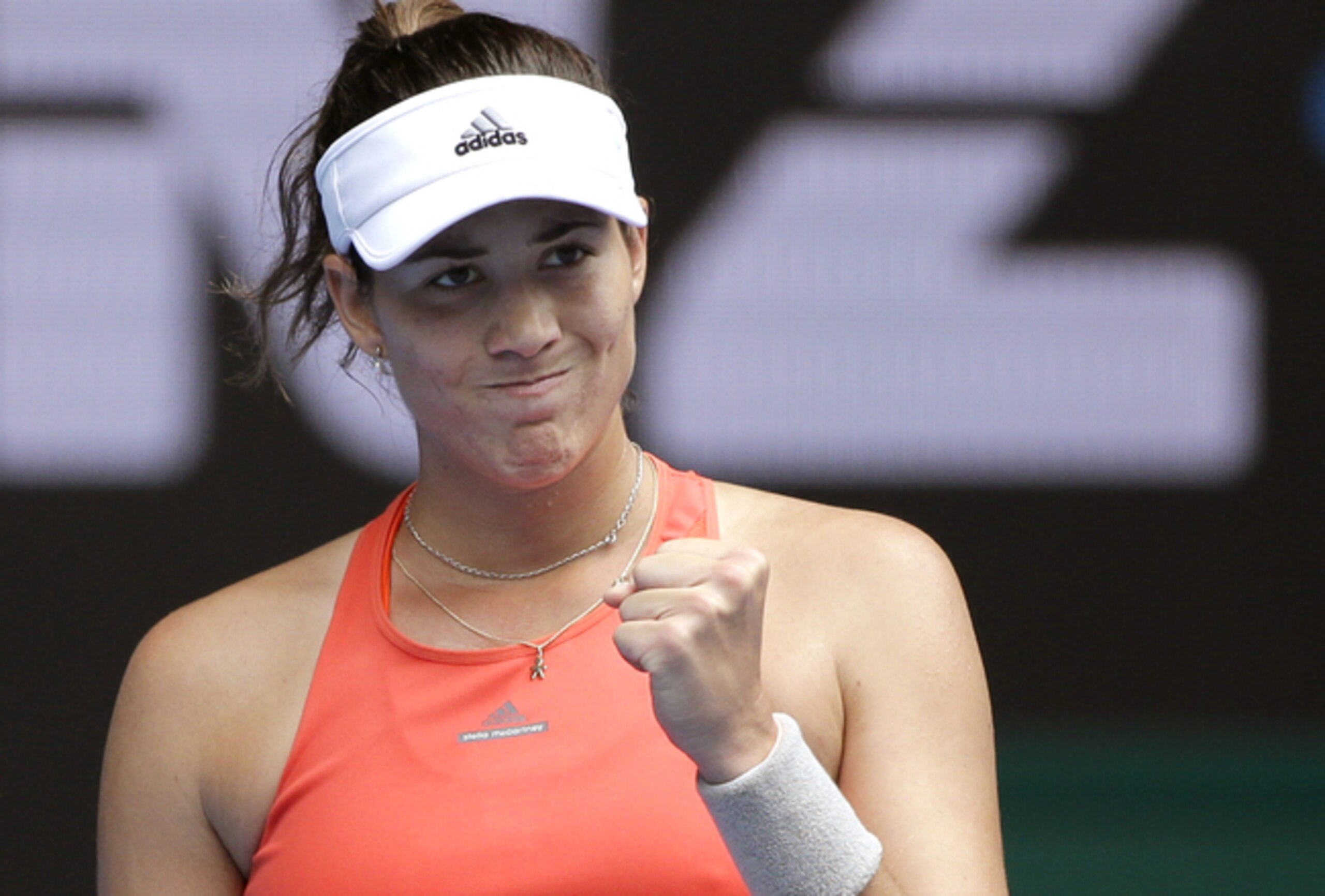 Garbine Muguruza fist pumps during a match at the 2016 Australian Open.