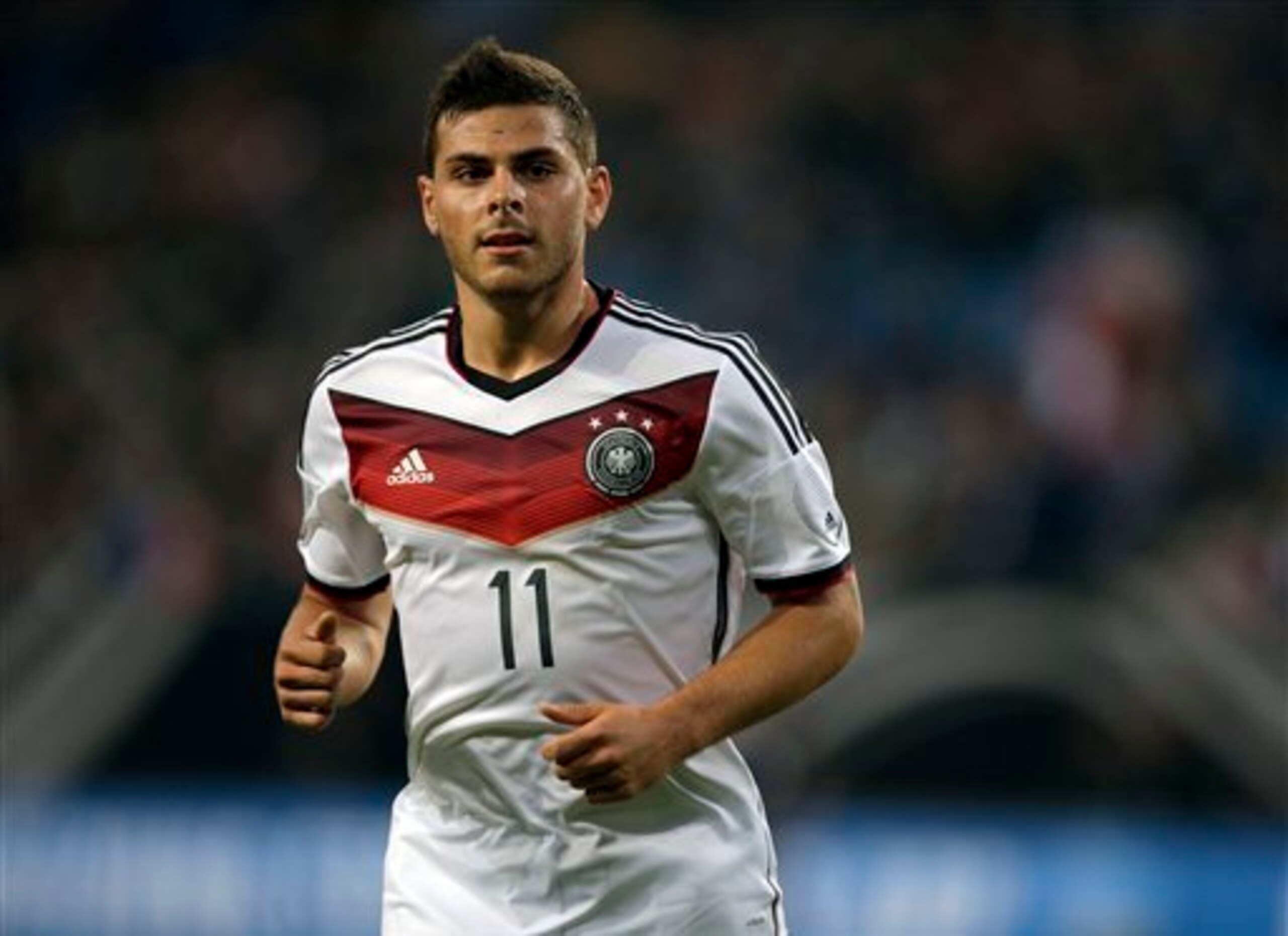Germany's Kevin Volland jogs during a friendly soccer match between Germany and Poland in Hamburg, Germany, Tuesday, May 13, 2014. The match ended in a 0-0 draw. (AP Photo/Michael Sohn)