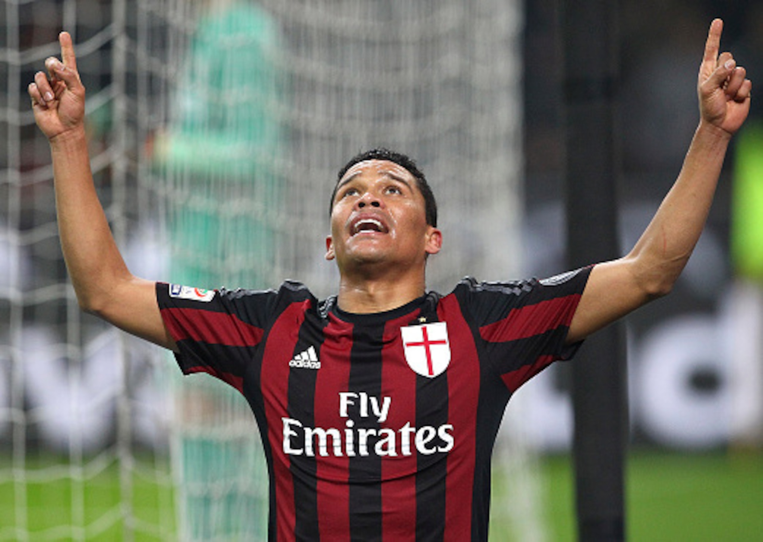 Carlos Bacca doubled AC Milan's lead with a poacher's finish.