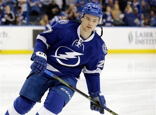 Tampa Bay Lightning left wing Jonathan Drouin remains suspended by the club for refusing to play for their AHL affiliate.