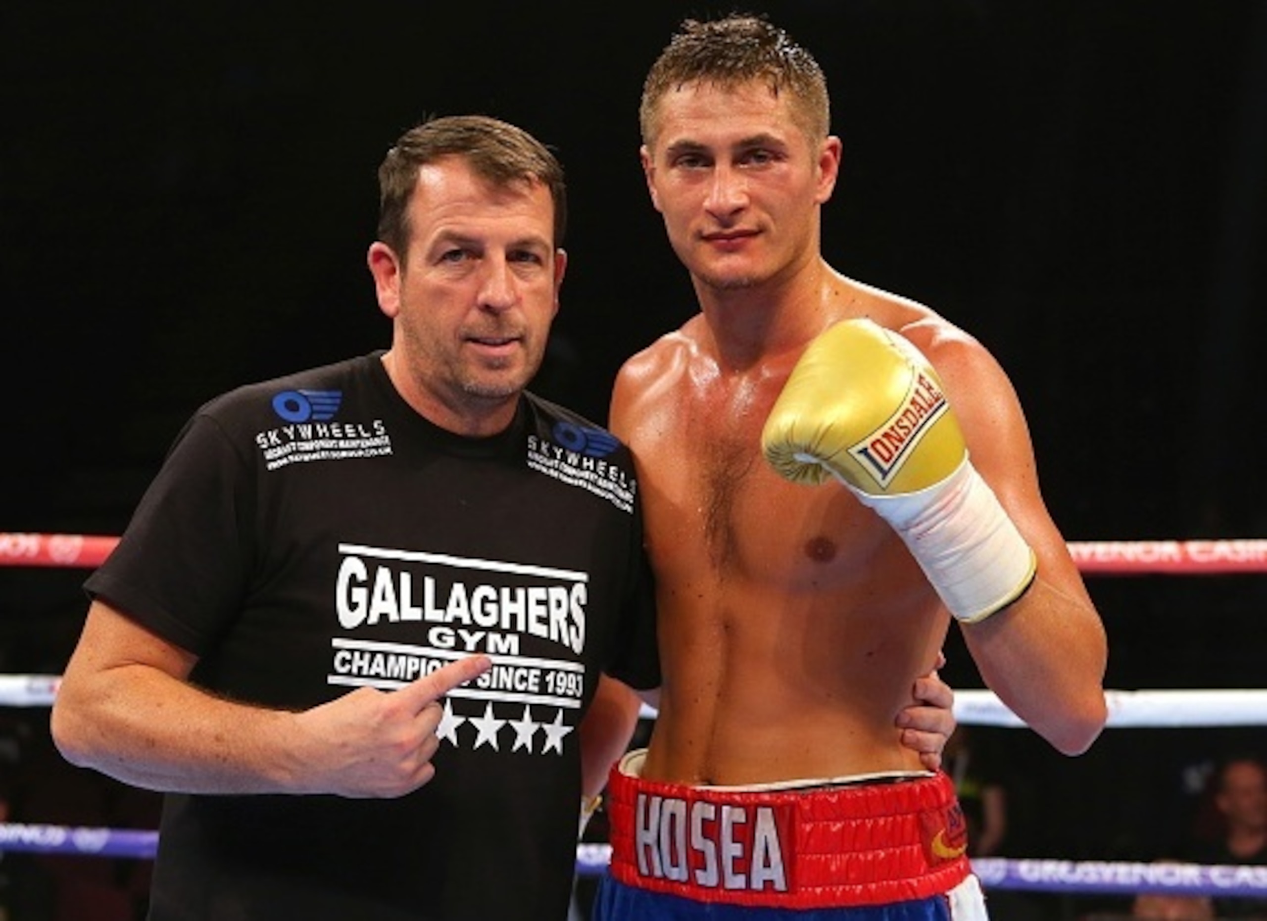 Trainer Joe Gallagher (left) poses with Hosea Burton.