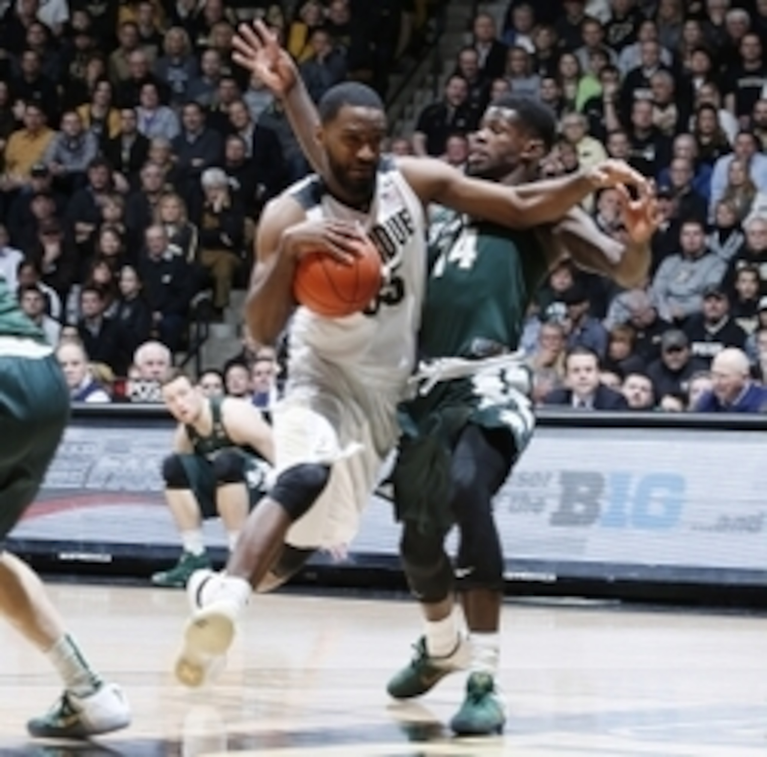 Feb 9, 2016; West Lafayette, IN, USA; Purdue Boilermakers guard Rapheal Davis (35) drives to the basket against Michigan State Spartans guard Eron Harris (14) at Mackey Arena. Mandatory Credit: Brian Spurlock-USA TODAY Sports