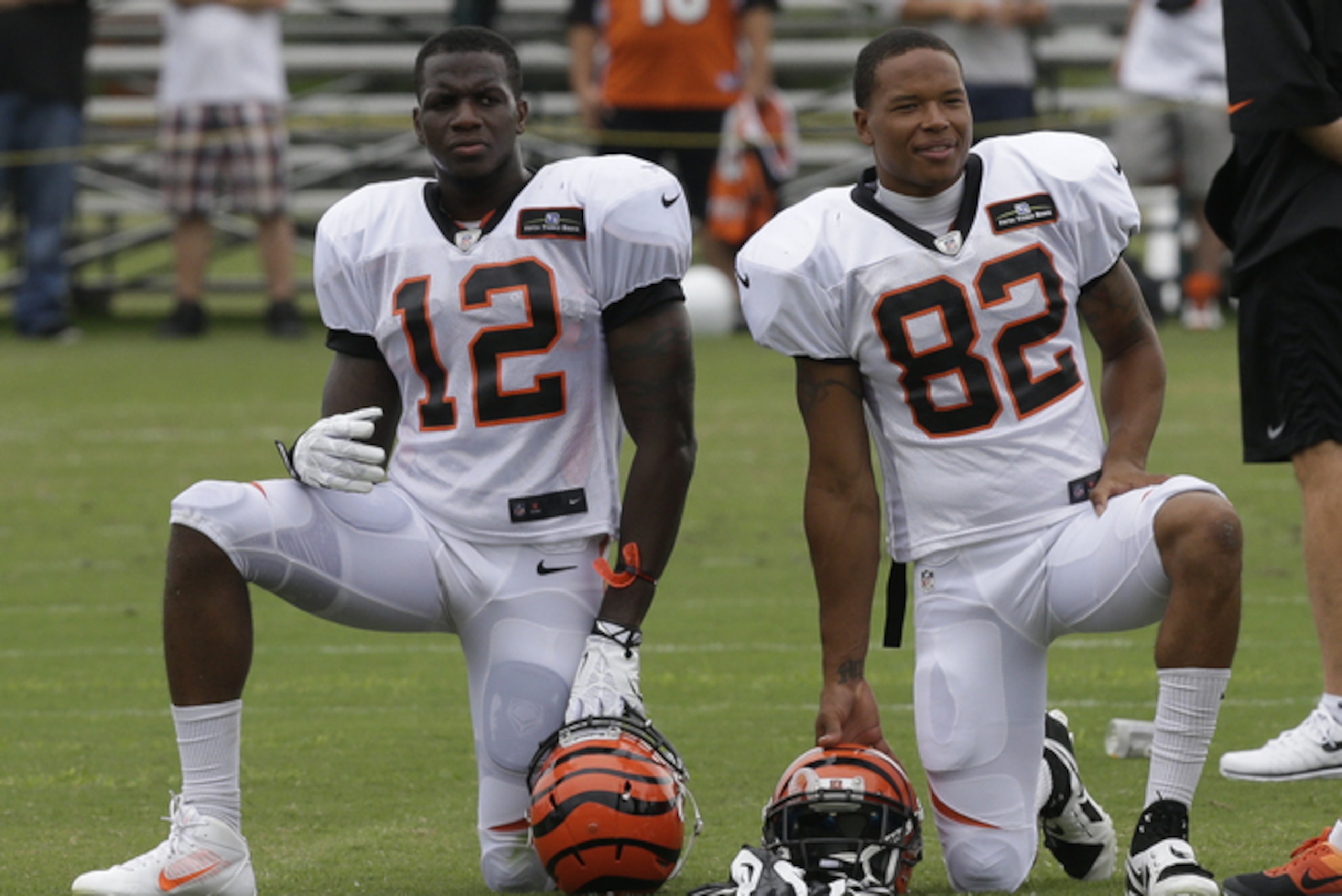 Could one of these two Cincinnati Bengals wide receivers—Mohamed Sanu (12, left) and Marvin Jones (82, right)—be headed to New England?
