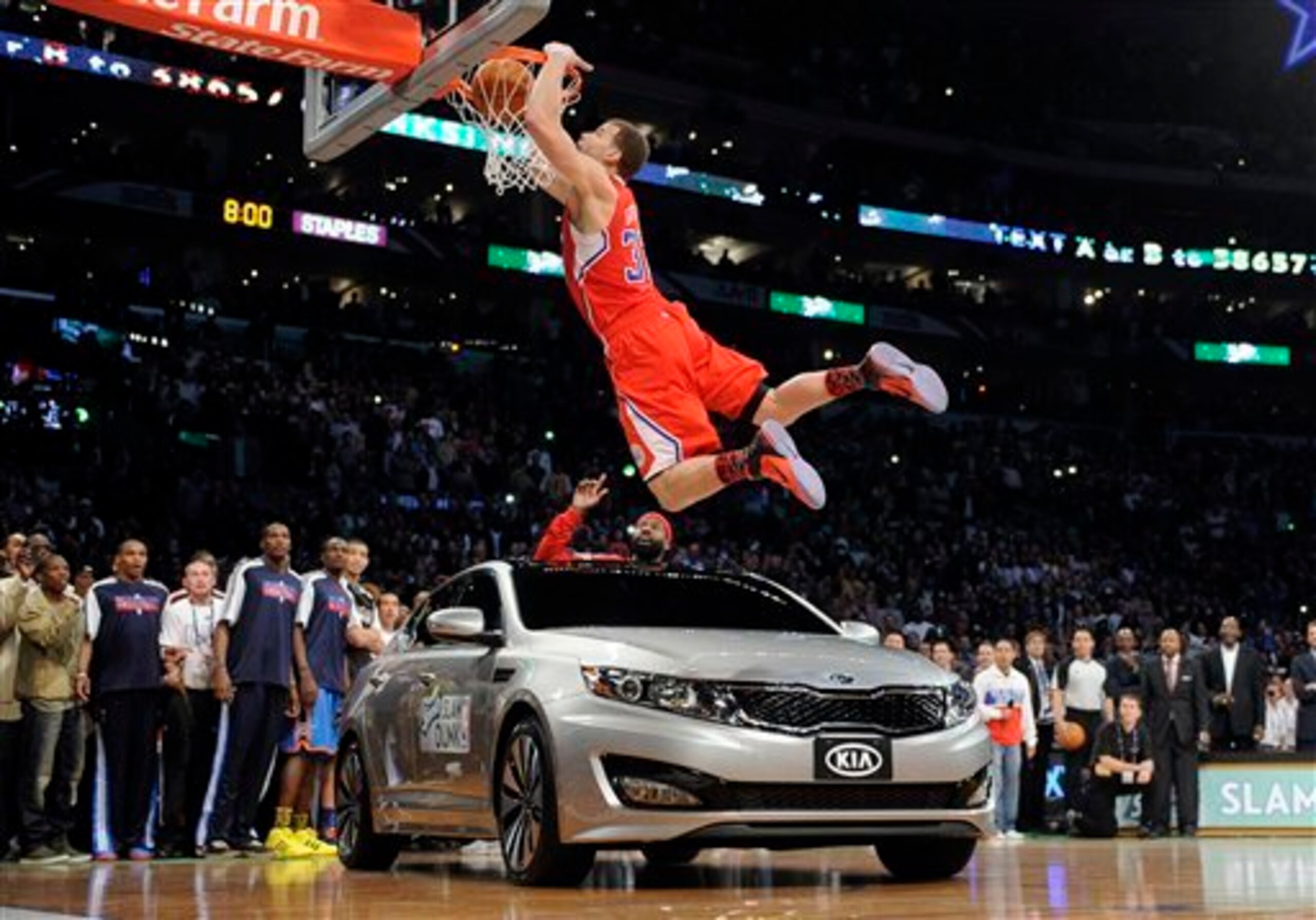 One of the most iconic dunk contest photos of all time, Griffin set the bar for utilizing props in this friendly competition.