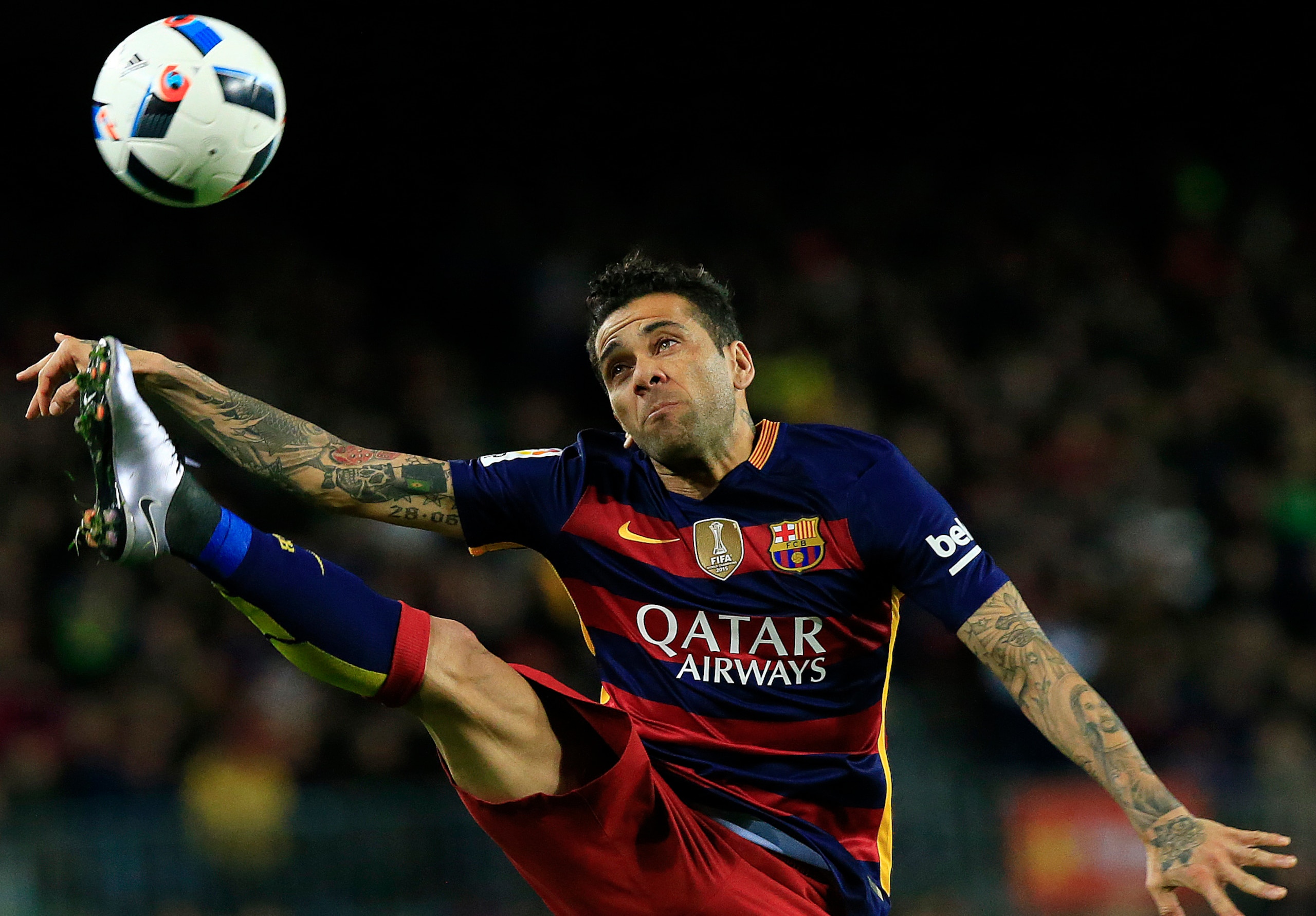 Dani Alves looked far from happy to be substituted in the second half.