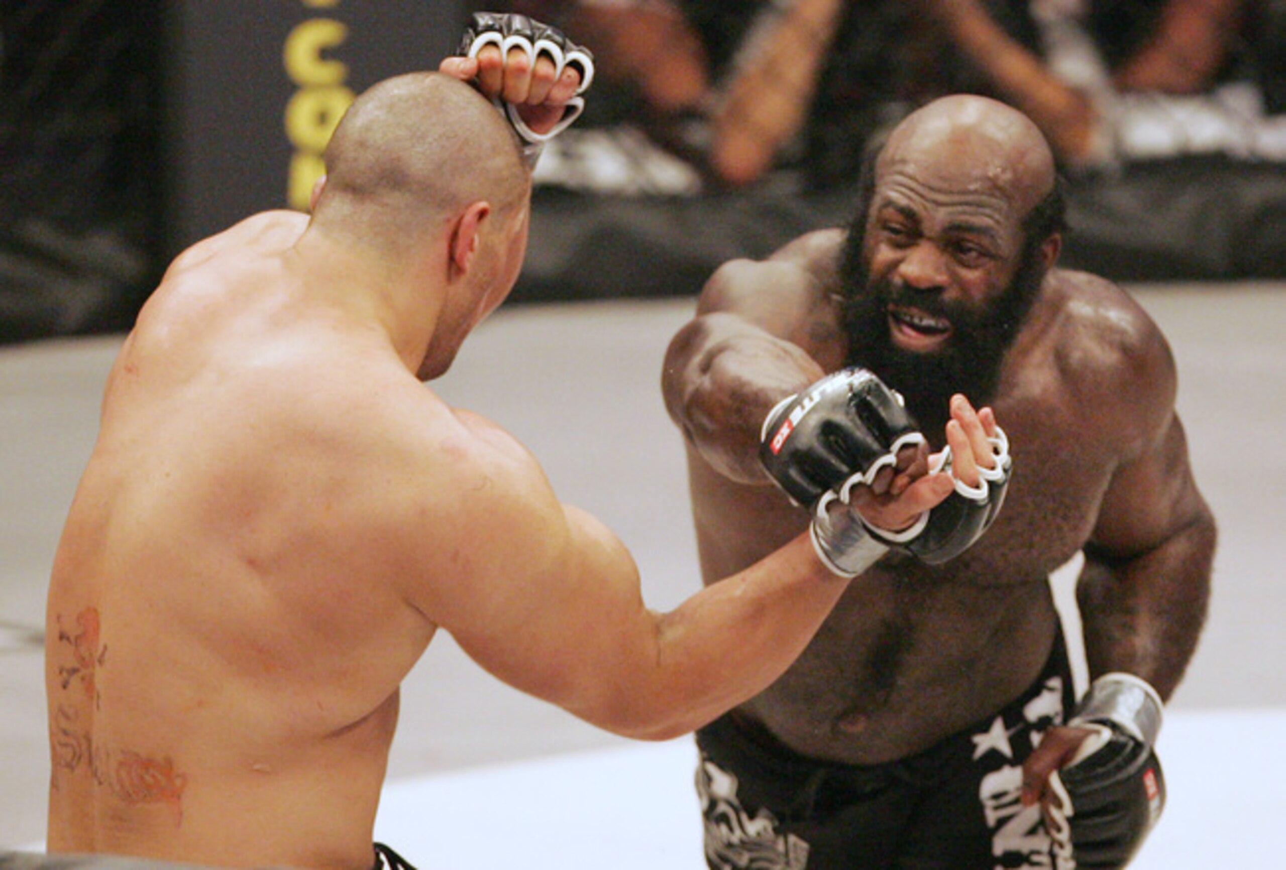 Kimbo Slice (right) fights James Thompson.