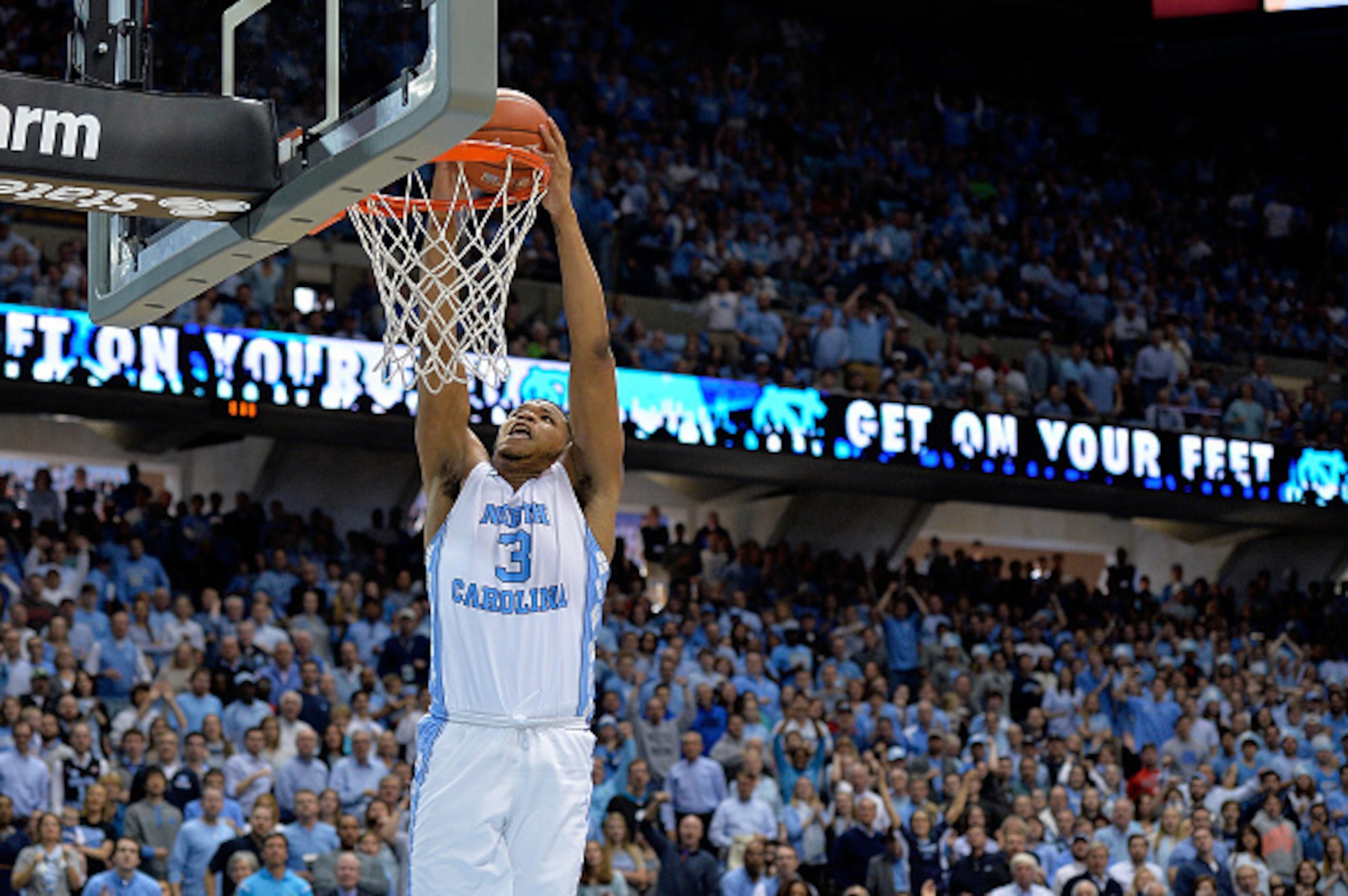 CHAPEL HILL, NC - JANUARY 16:  Kennedy Meeks #3 of the North Carolina Tar Heels dunks against the North Carolina State Wolfpack during their game at the Dean Smith Center on January 16, 2016 in Chapel Hill, North Carolina. North Carolina won 67-55.  (Phot
