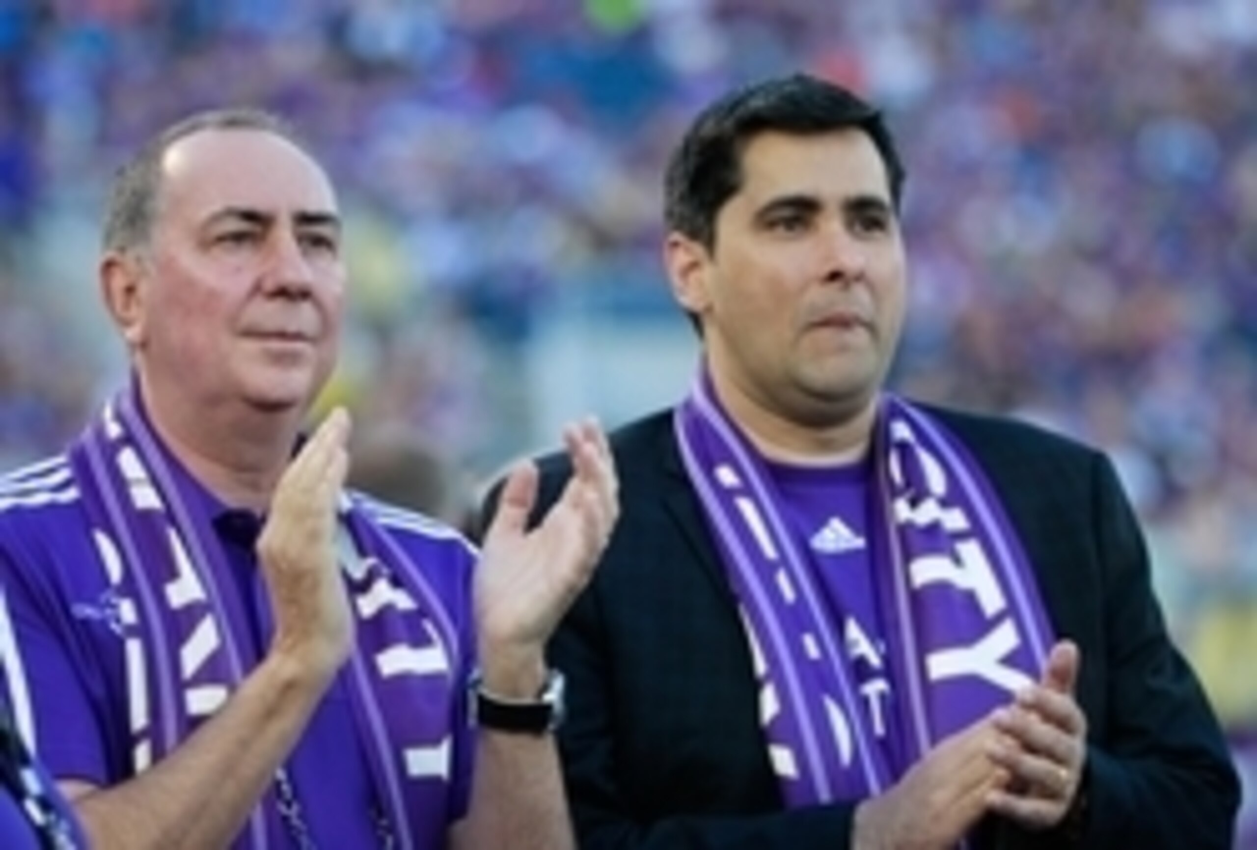 May 30, 2015; Orlando, FL, USA; Orlando City SC president and founder Phil Rawlins and chairman and majority owner Flavio Augusto da Silva prior to the game against the Columbus Crew at Orlando Citrus Bowl Stadium. Mandatory Credit: Kim Klement-USA TODAY 