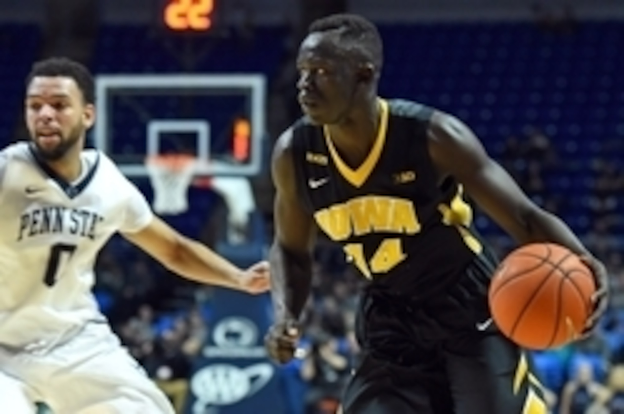 Feb 17, 2016; University Park, PA, USA; Iowa Hawkeyes guard Peter Jok (14) drives to the basket past Penn State Nittany Lions forward Donovon Jack (5) during the second half at the Bryce Jordan Center.  The Nittany Lions won 79-75.  Mandatory Credit: Rich