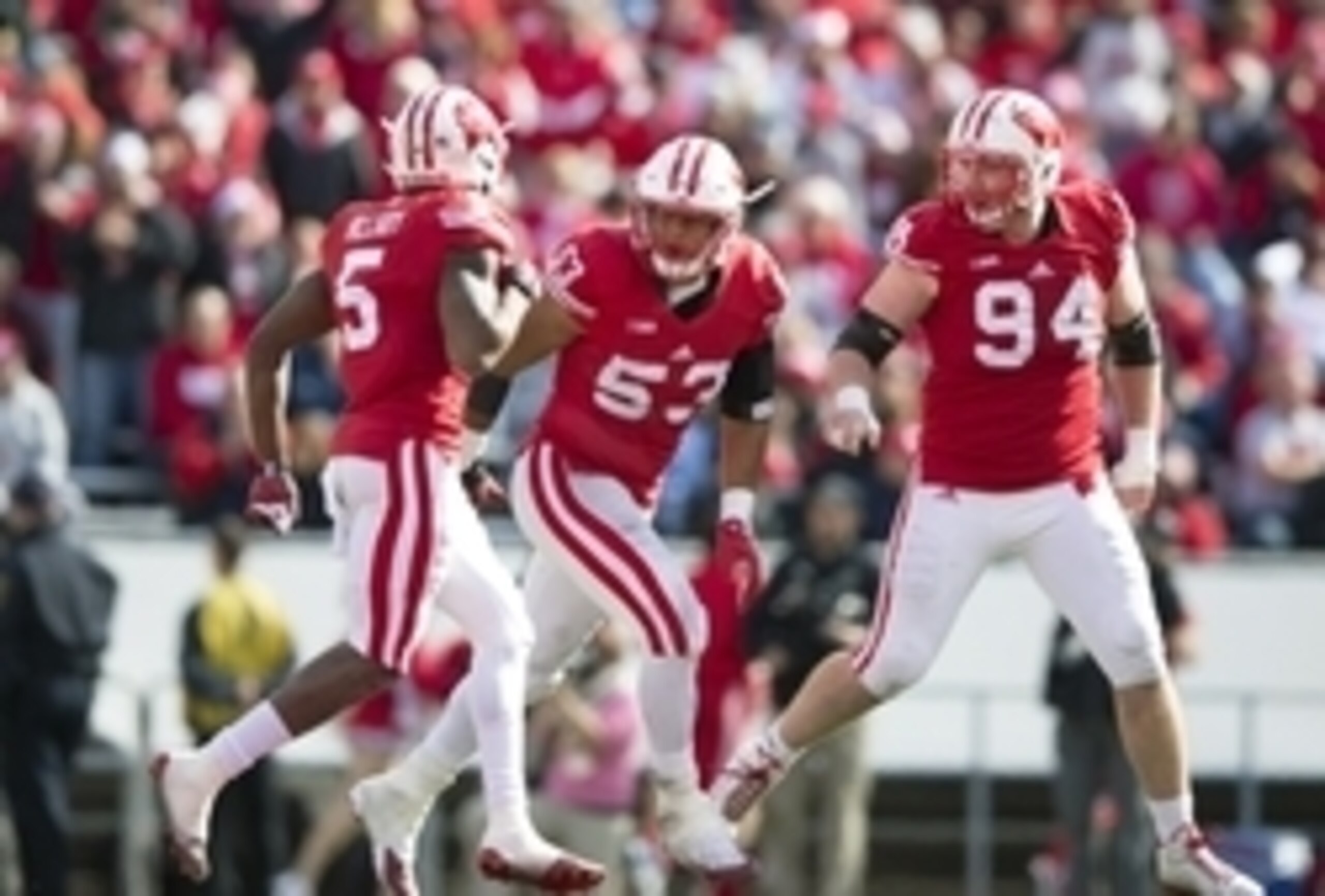 Wisconsin LB T.J. Edwards (center) and DT Conor Sheehy (right) Wisconsin LB T.J. Edwards (center) and DT Conor Sheehy (right)