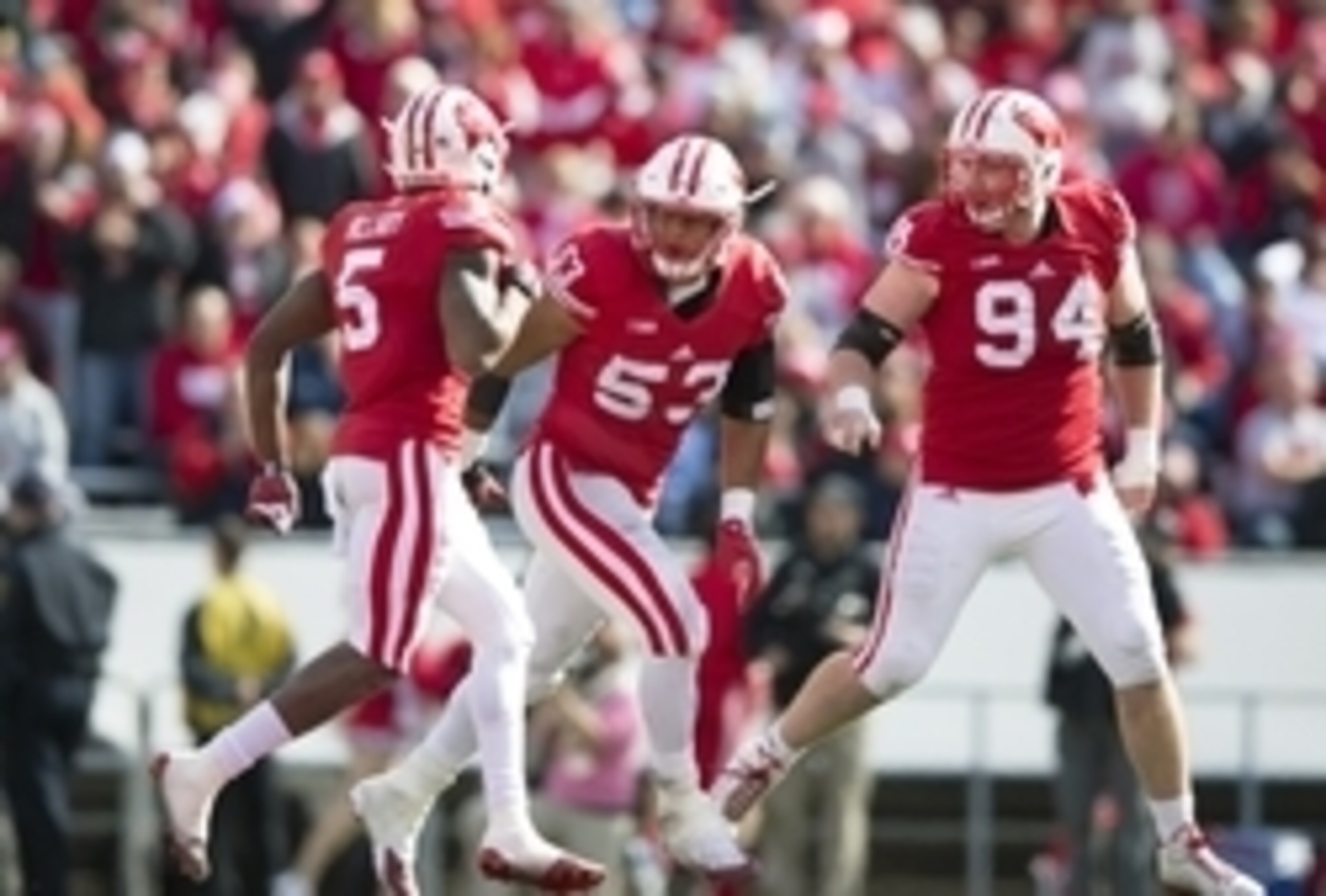 Wisconsin LB T.J. Edwards (center) and DT Conor Sheehy (right) Wisconsin LB T.J. Edwards (center) and DT Conor Sheehy (right)
