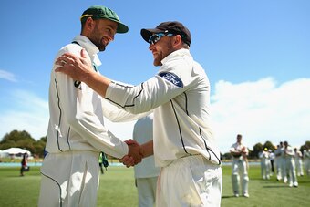 Brendon McCullum (right) shakes the hand of Australia's Nathan Lyon after playing in his final Test.