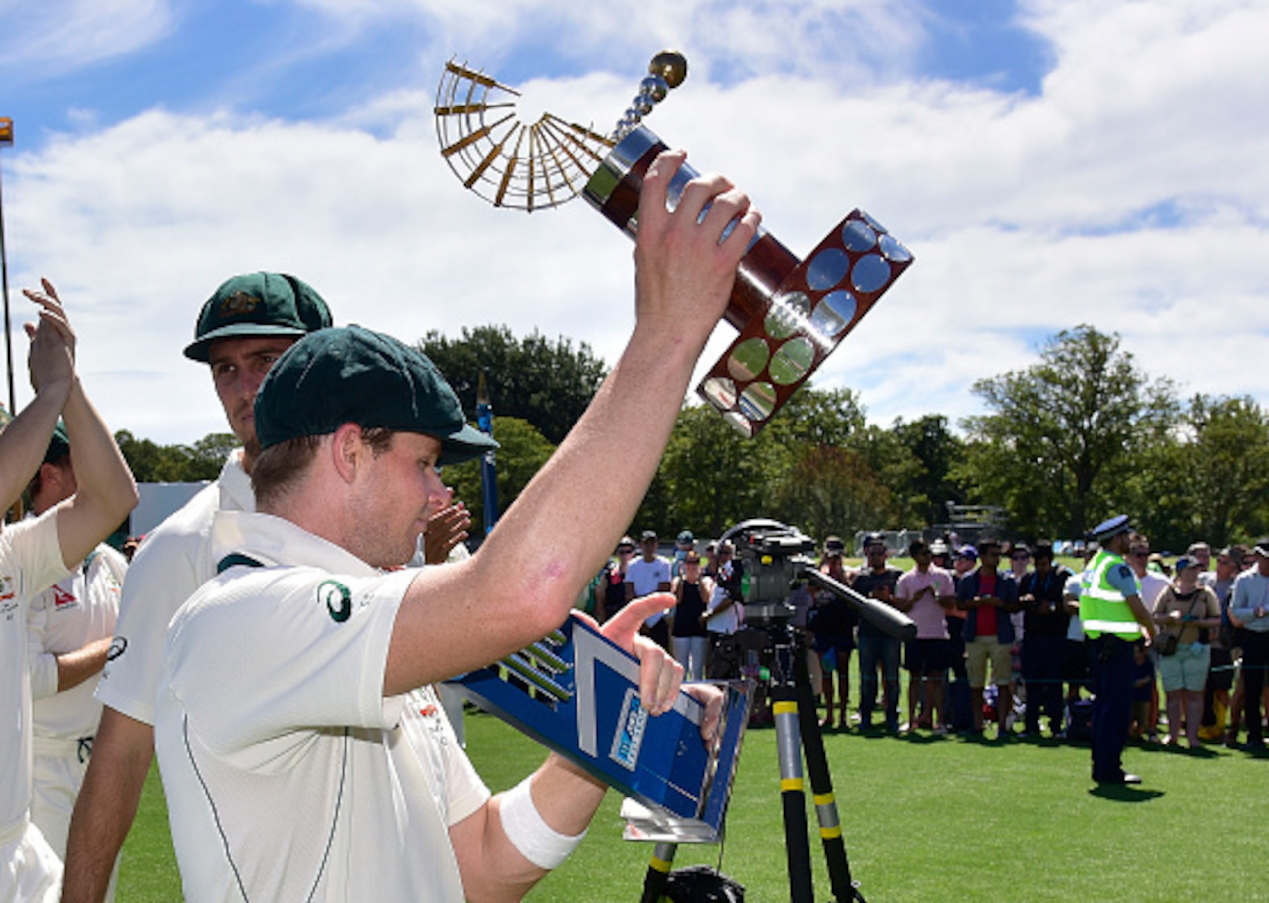 Steve Smith shows off the trophy after Australia clinched a 2-0 series victory.
