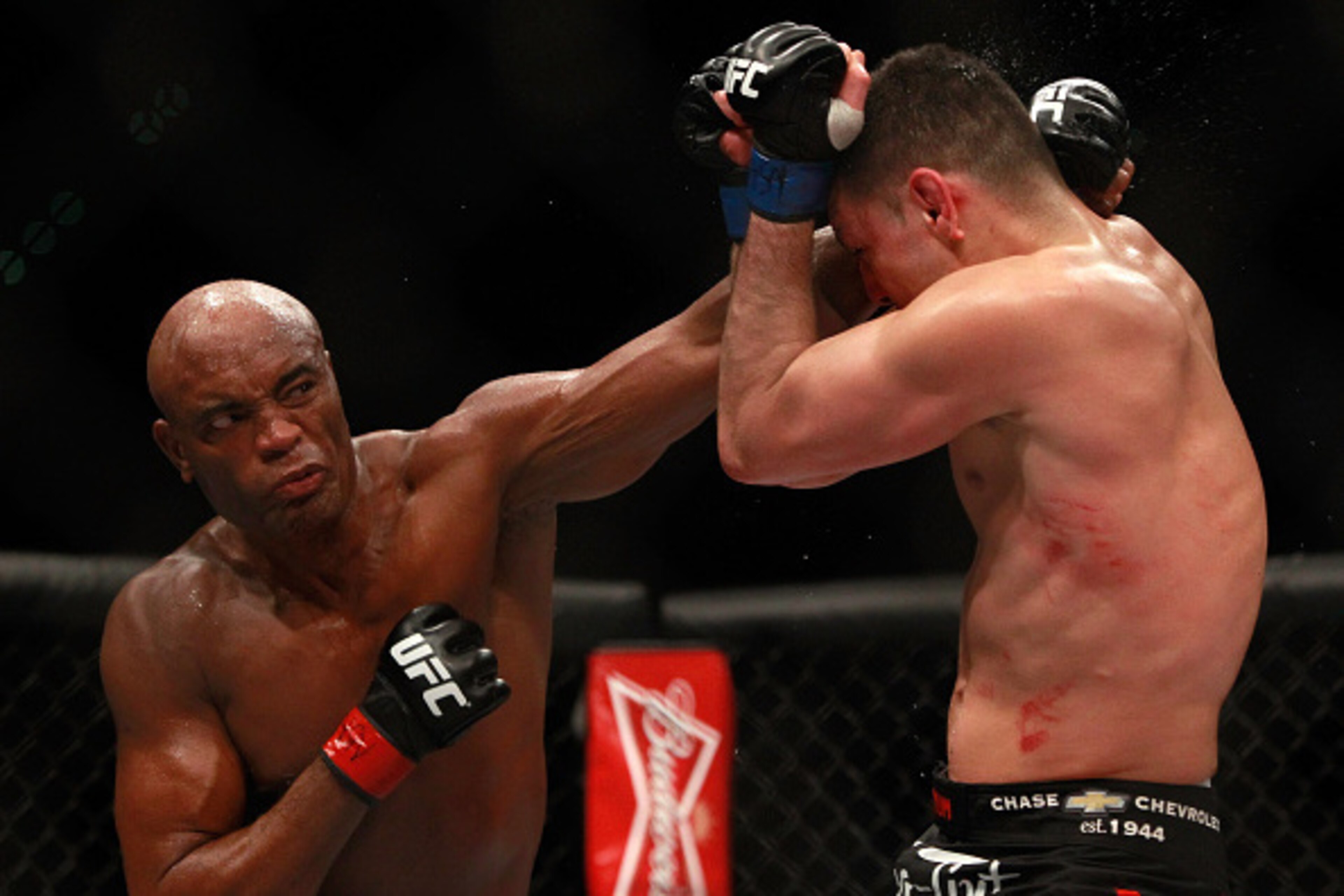 Anderson Silva punches Nick Diaz