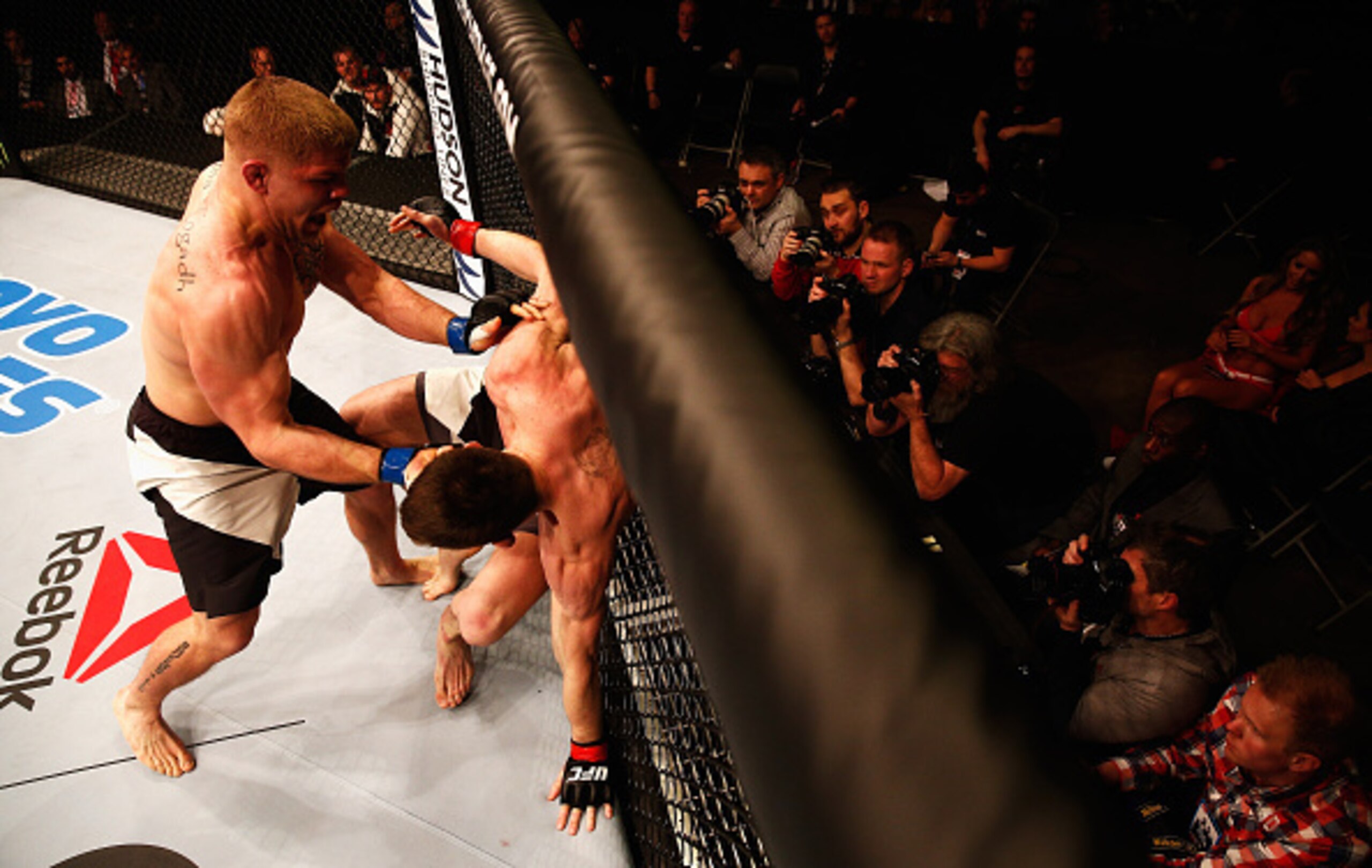 Scott Askham (left) goes in for the knockout on Chris Dempsey.