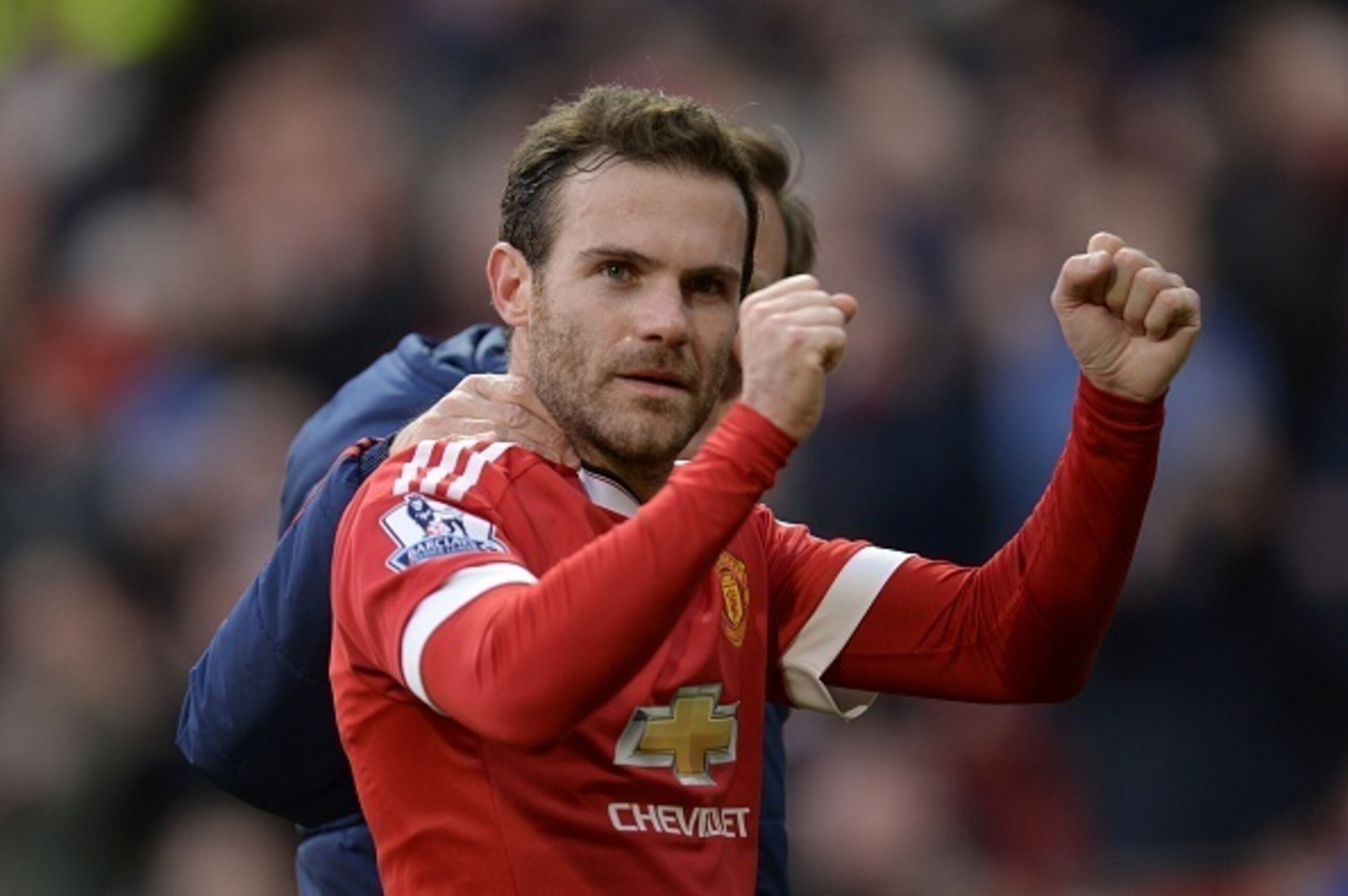 Mata celebrates United's win over Arsenal. Mata celebrates United's win over Arsenal.