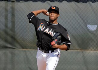 Edwin Jackson will try to hold off a number of young starters to win the Marlins' final rotation spot.