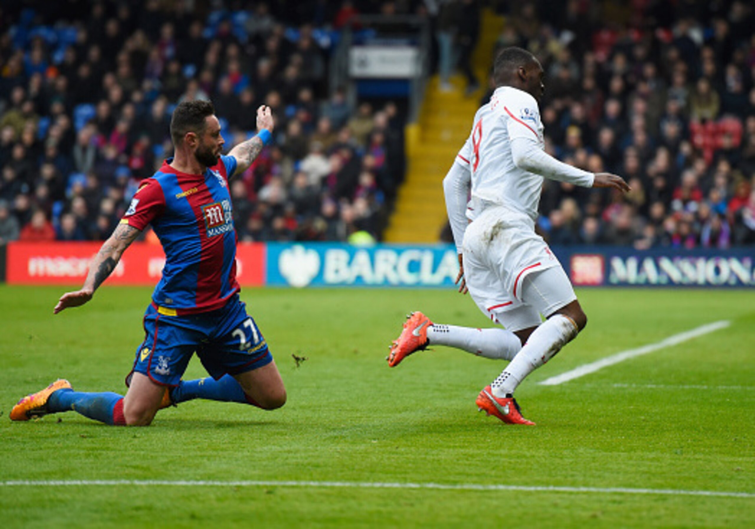 Damien Delaney clipped Liverpool striker Christian Benteke inside the area.