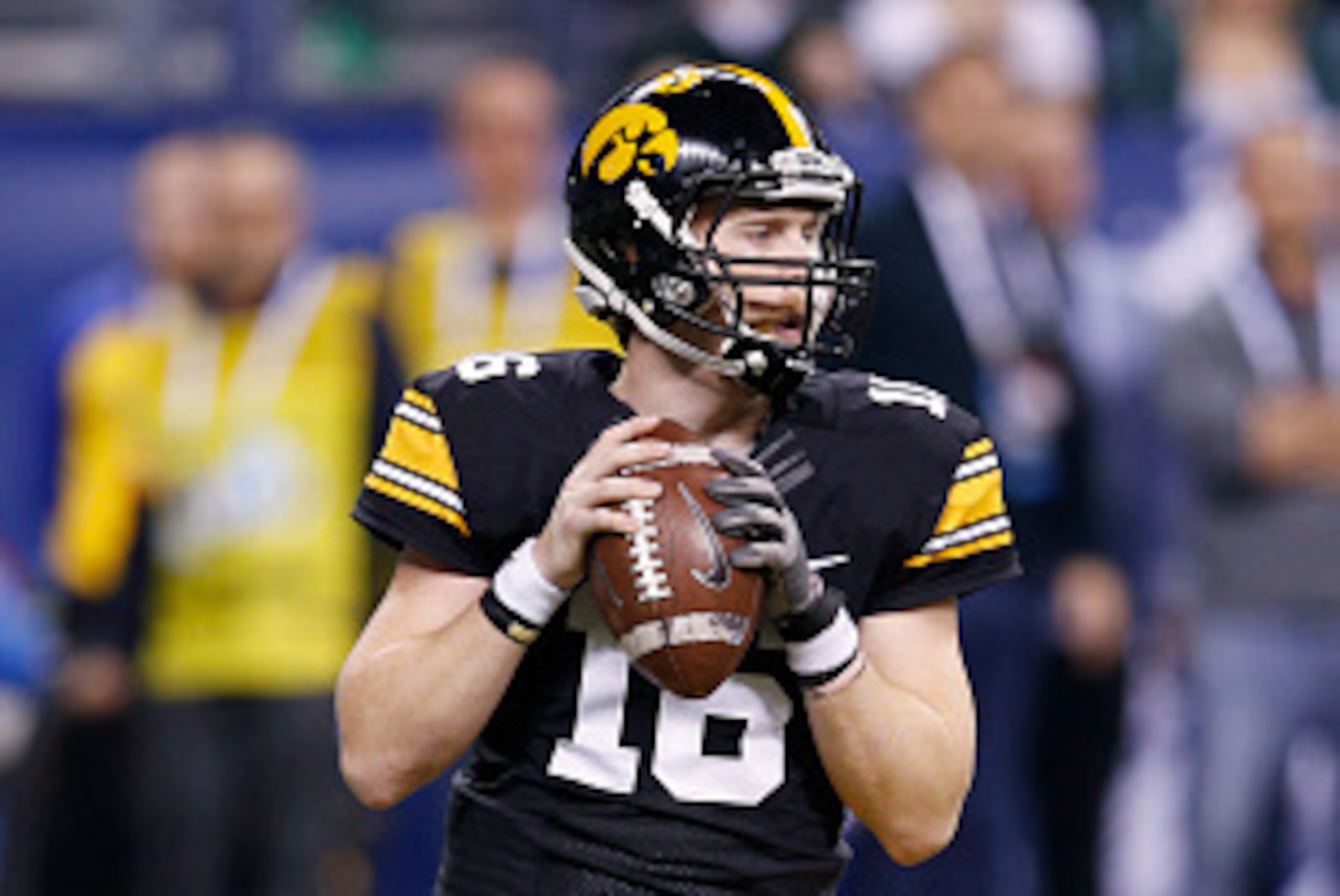 INDIANAPOLIS, IN - DECEMBER 5: C.J. Beathard #16 of the Iowa Hawkeyes looks to pass against the Michigan State Spartans during the Big Ten Championship at Lucas Oil Stadium on December 5, 2015 in Indianapolis, Indiana. Michigan State defeated Iowa 16-13. 