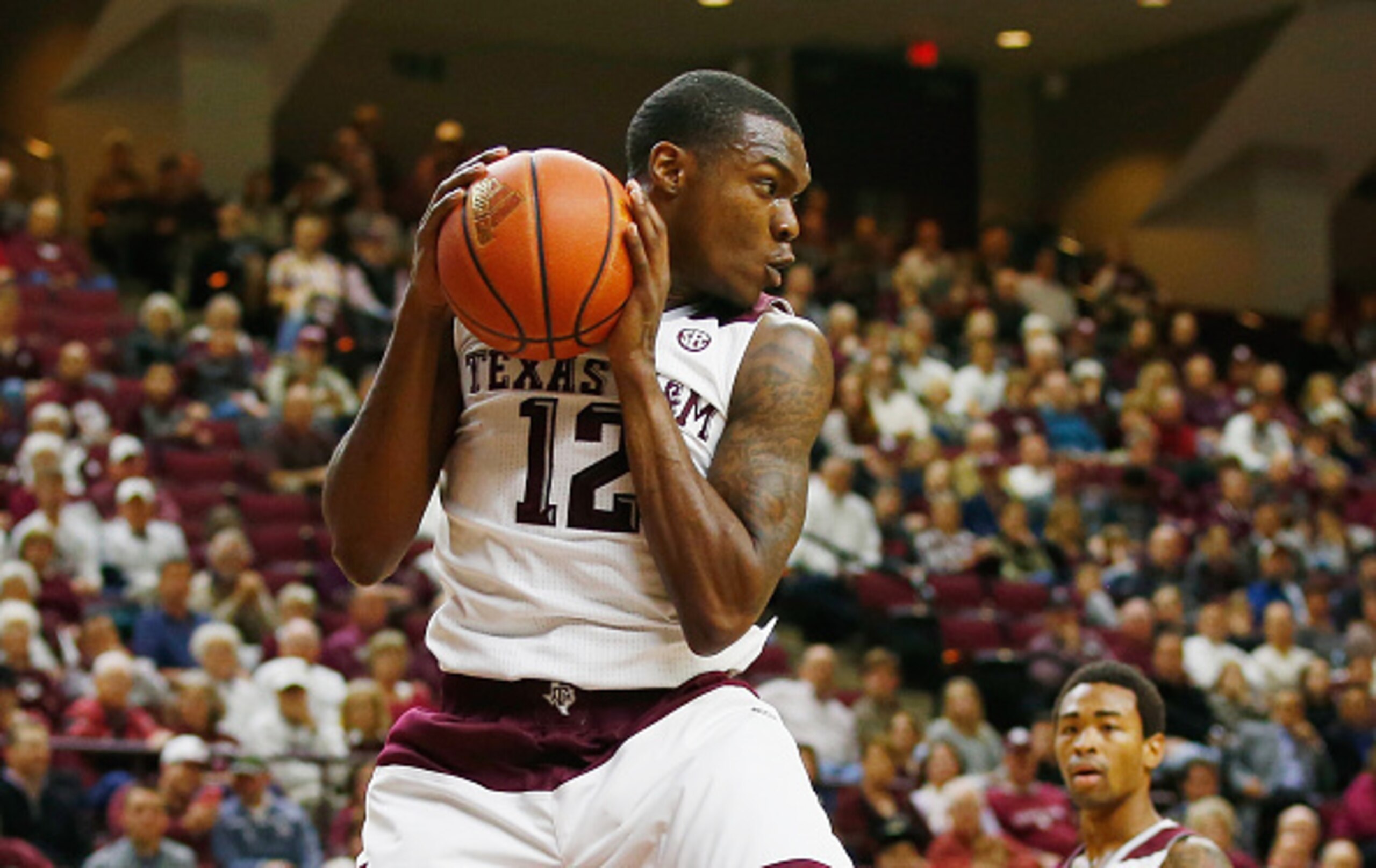 COLLEGE STATION, TX - FEBRUARY 24:  Jalen Jones #12 of the Texas A&M Aggies grabs a rebound during their game against the Mississippi State Bulldogs at Reed Arena on February 24, 2016 in College Station, Texas.  (Photo by Scott Halleran/Getty Images)