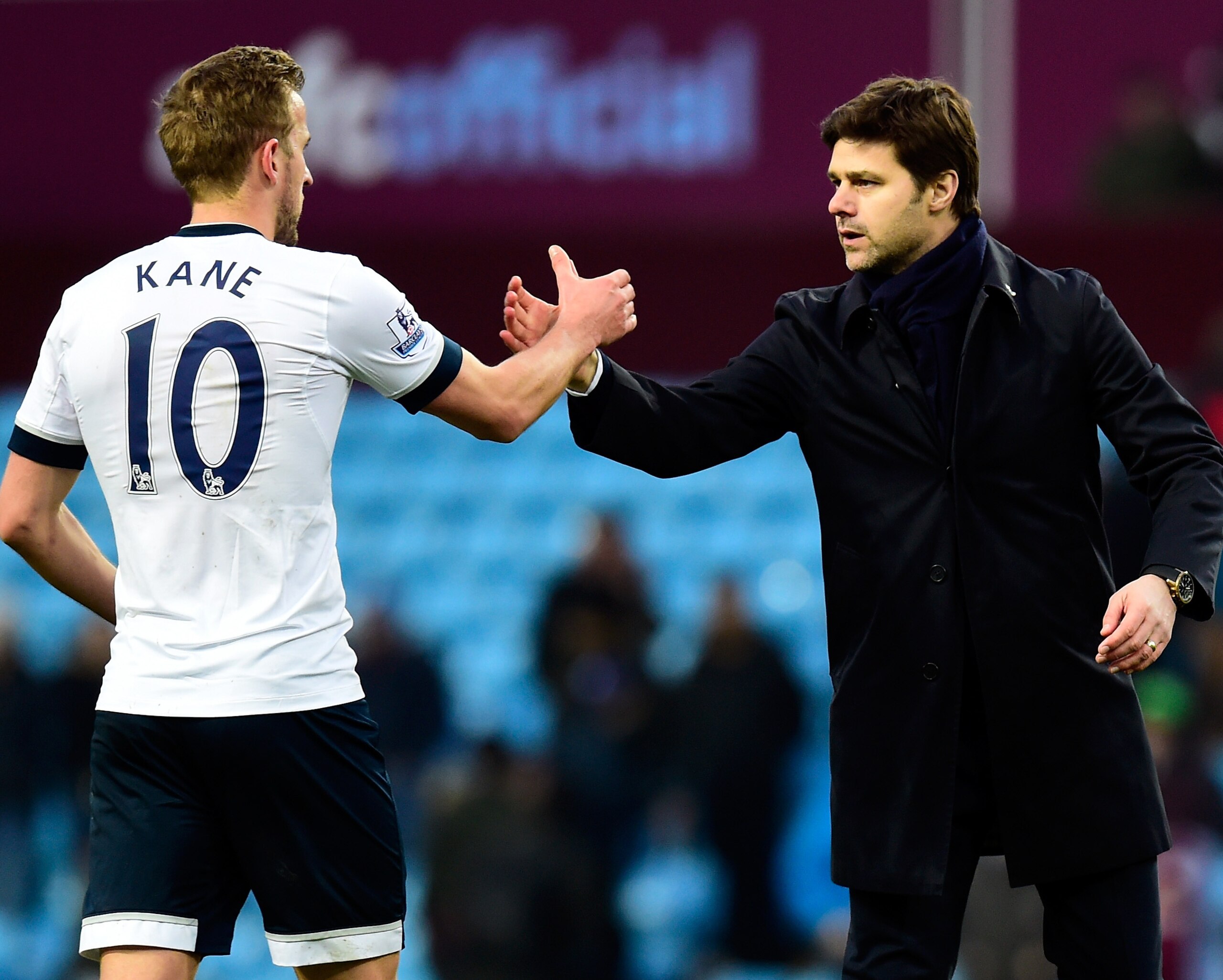 Harry Kane is congratulated by his manager, Mauricio Pochettino, after his two-goal haul.