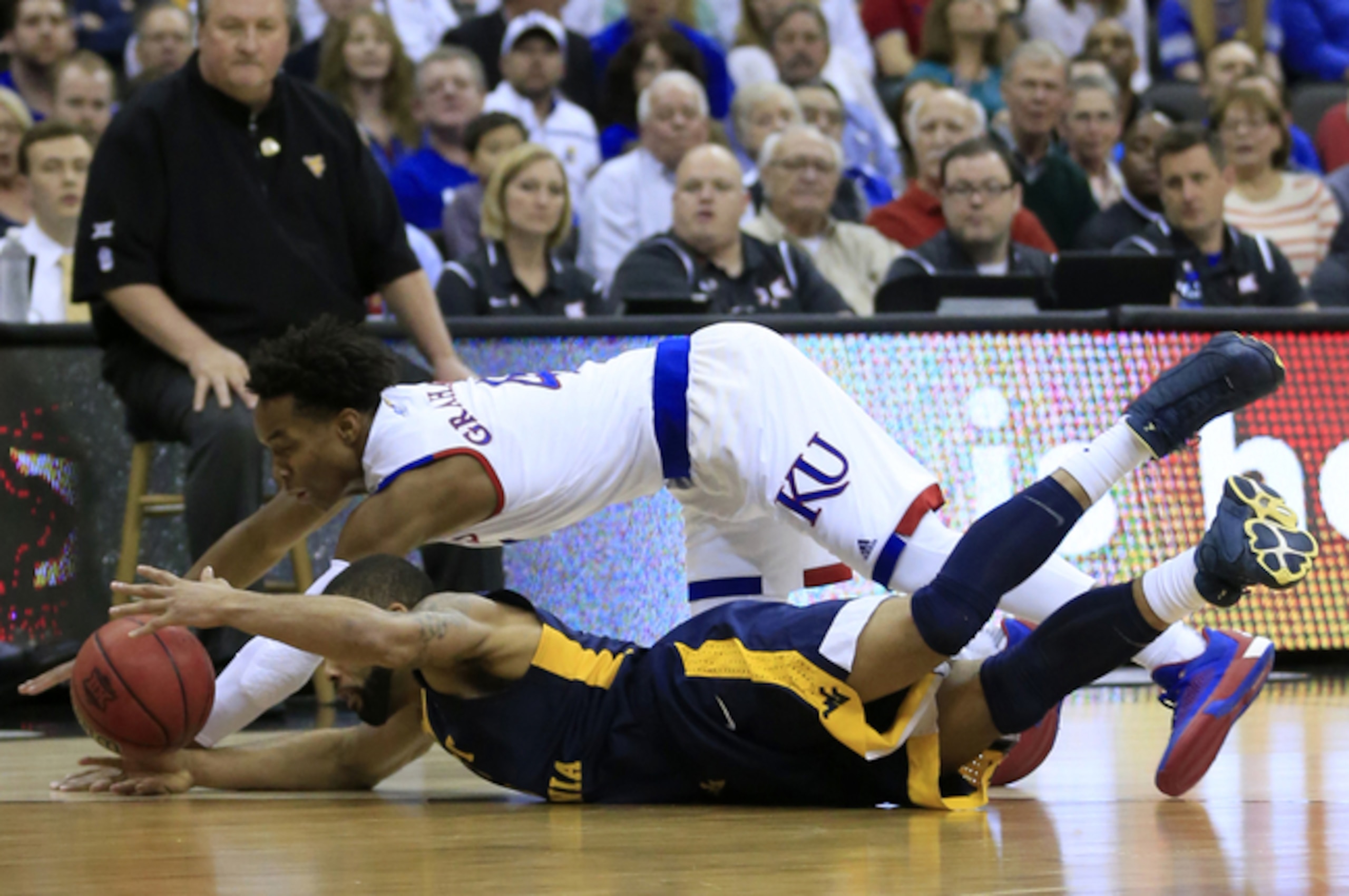 Kansas took down West Virginia in the Big 12 tournament and is a favorite in the NCAA tourney as well. Kansas took down West Virginia in the Big 12 tournament and is a favorite in the NCAA tourney as well.