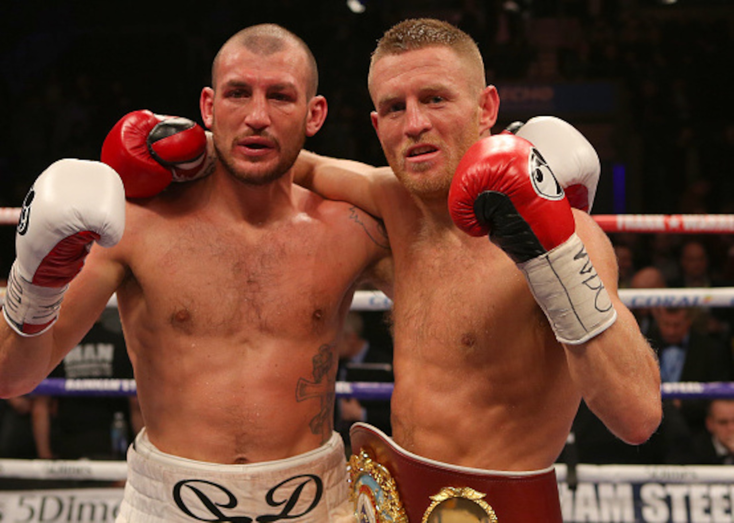 Derry Mathews and Terry Flanagan pose for the camera after their fight in Liverpool.