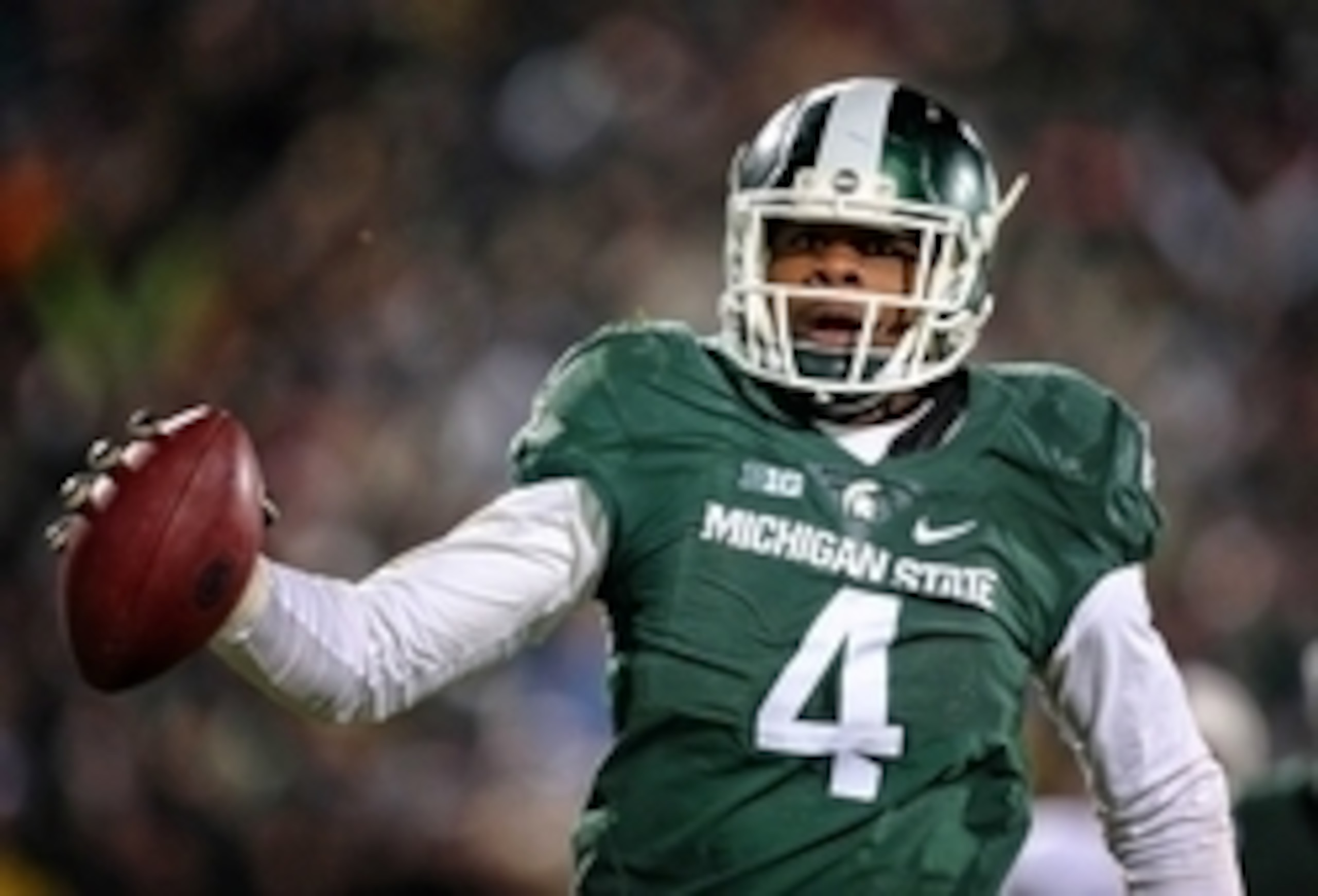 Nov 28, 2015; East Lansing, MI, USA; Michigan State Spartans defensive lineman Malik McDowell (4) scores on a pick 6 during the 2nd half of a game against the Penn State Nittany Lions at Spartan Stadium. Mandatory Credit: Mike Carter-USA TODAY Sports Nov 28, 2015; East Lansing, MI, USA; Michigan State Spartans defensive lineman Malik McDowell (4) scores on a pick 6 during the 2nd half of a game against the Penn State Nittany Lions at Spartan Stadium. Mandatory Credit: Mike Carter-USA TODAY Sports