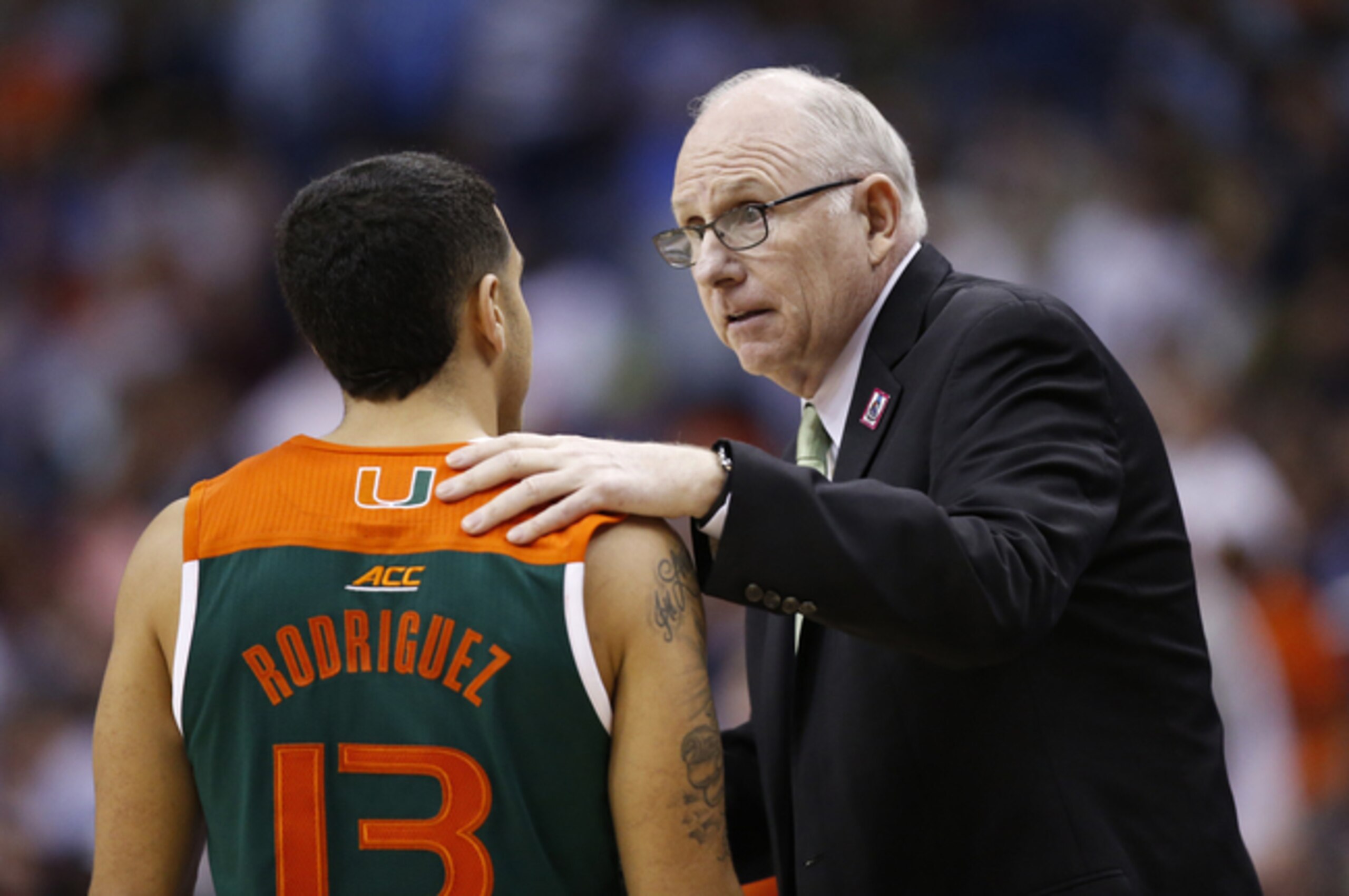 Angel Rodriguez and coach Jim Larranaga